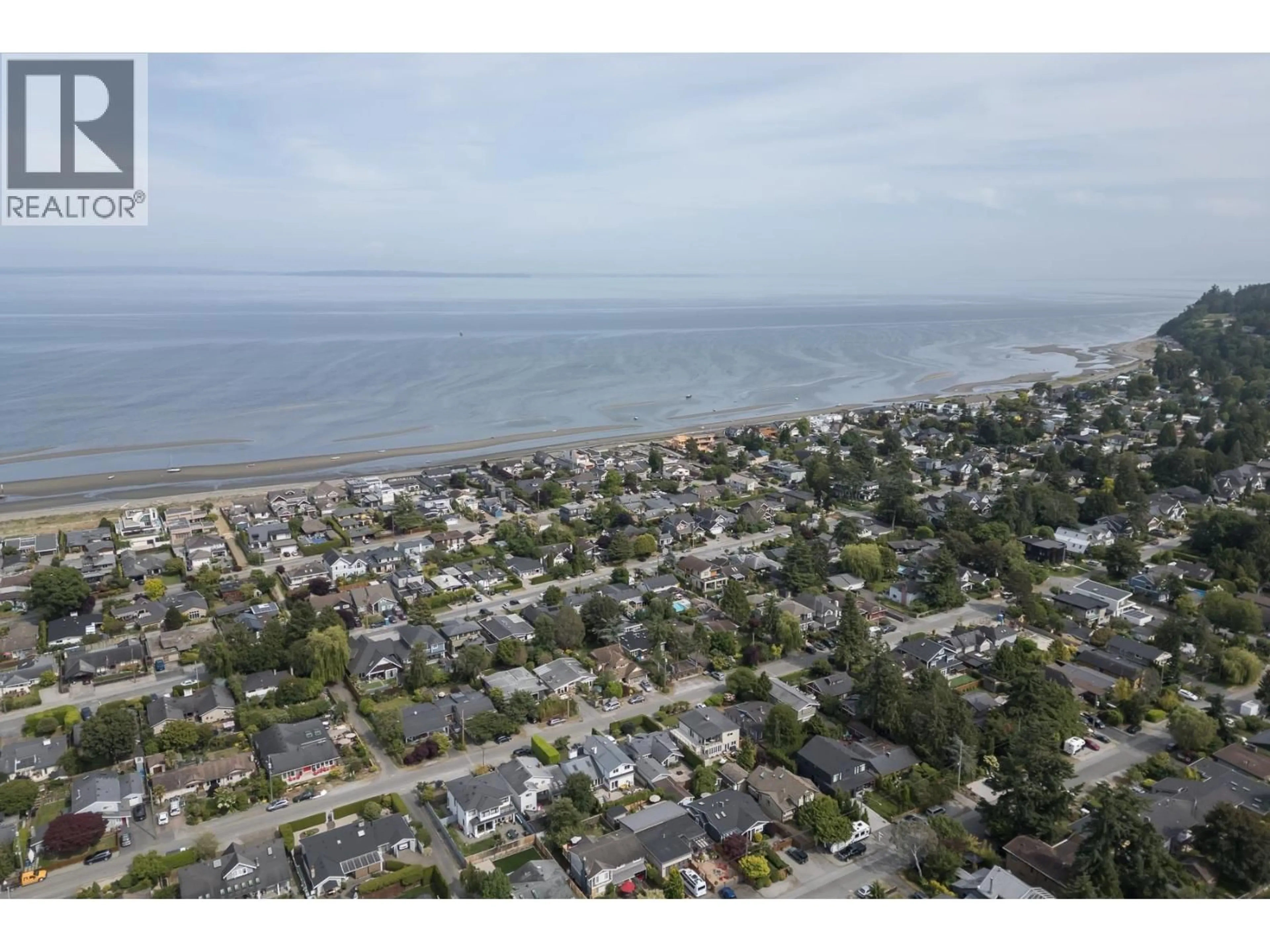 A pic from outside/outdoor area/front of a property/back of a property/a pic from drone, water/lake/river/ocean view for 211 67 STREET, Delta British Columbia V4L1M2