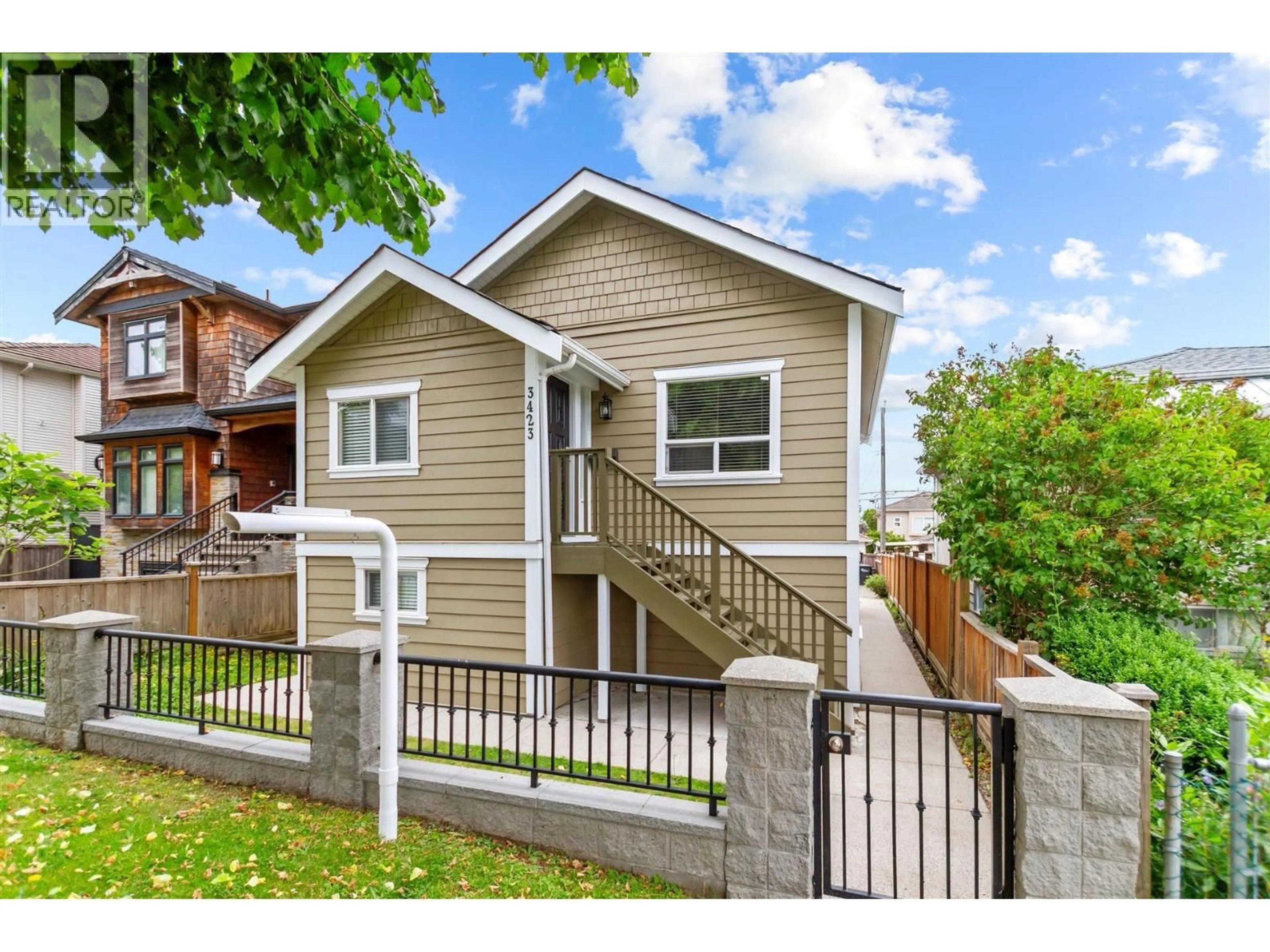 Home with vinyl exterior material, street for 3423 27TH AVENUE, Vancouver British Columbia V5R1P8