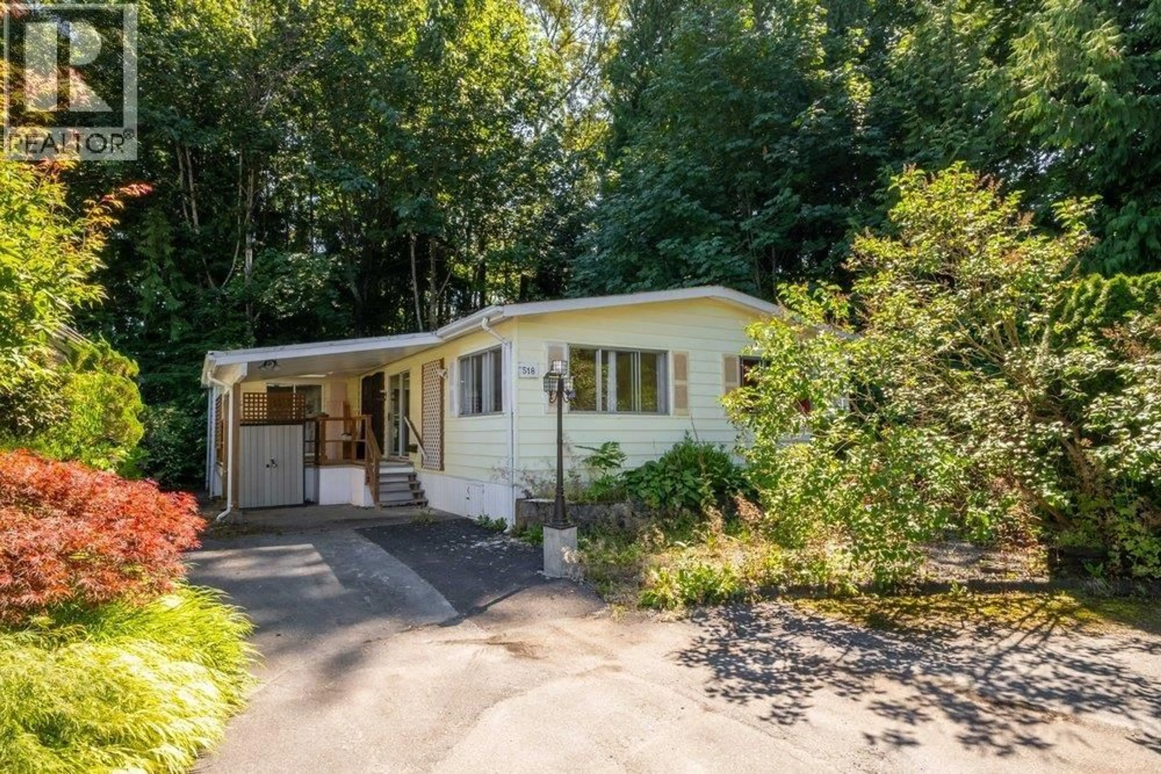 Home with vinyl exterior material, street for 518 TYEE COURT, North Vancouver British Columbia V7P3K3