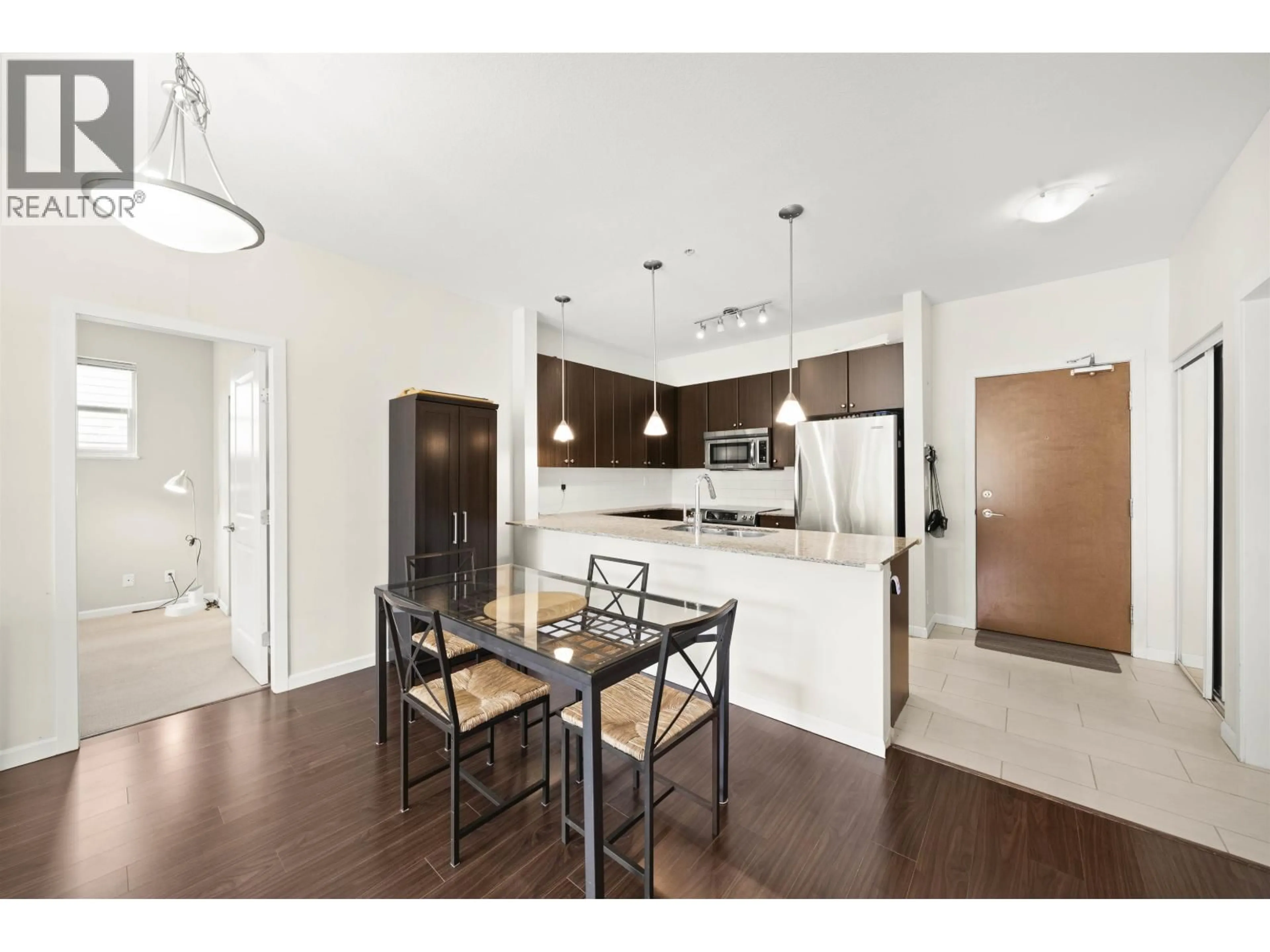 Open concept kitchen, wood/laminate floor for 301 - 275 ROSS DRIVE, New Westminster British Columbia V3L0B6