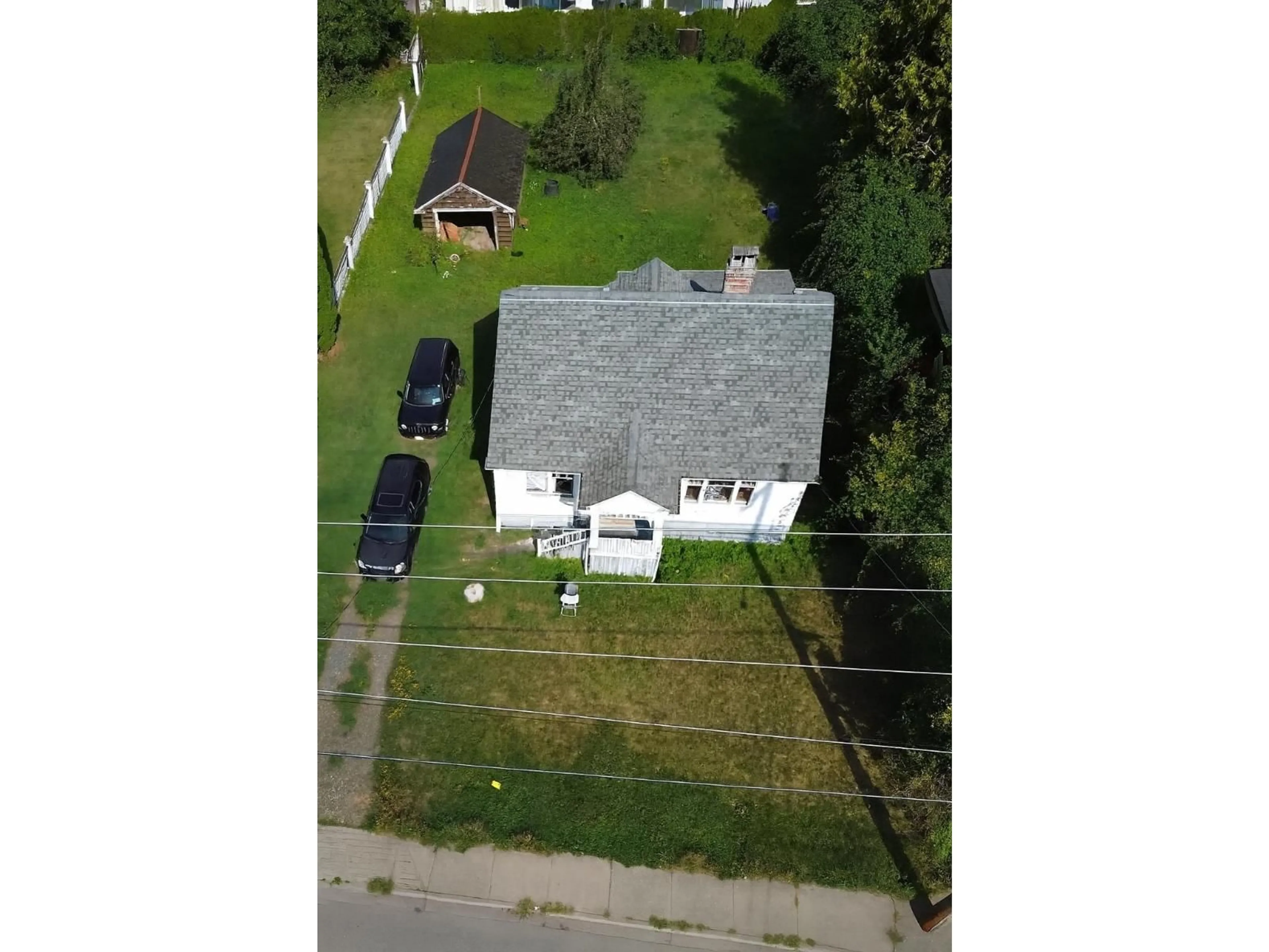 A pic from outside/outdoor area/front of a property/back of a property/a pic from drone, street for 46821 YALE ROAD, Chilliwack British Columbia V2P2S5