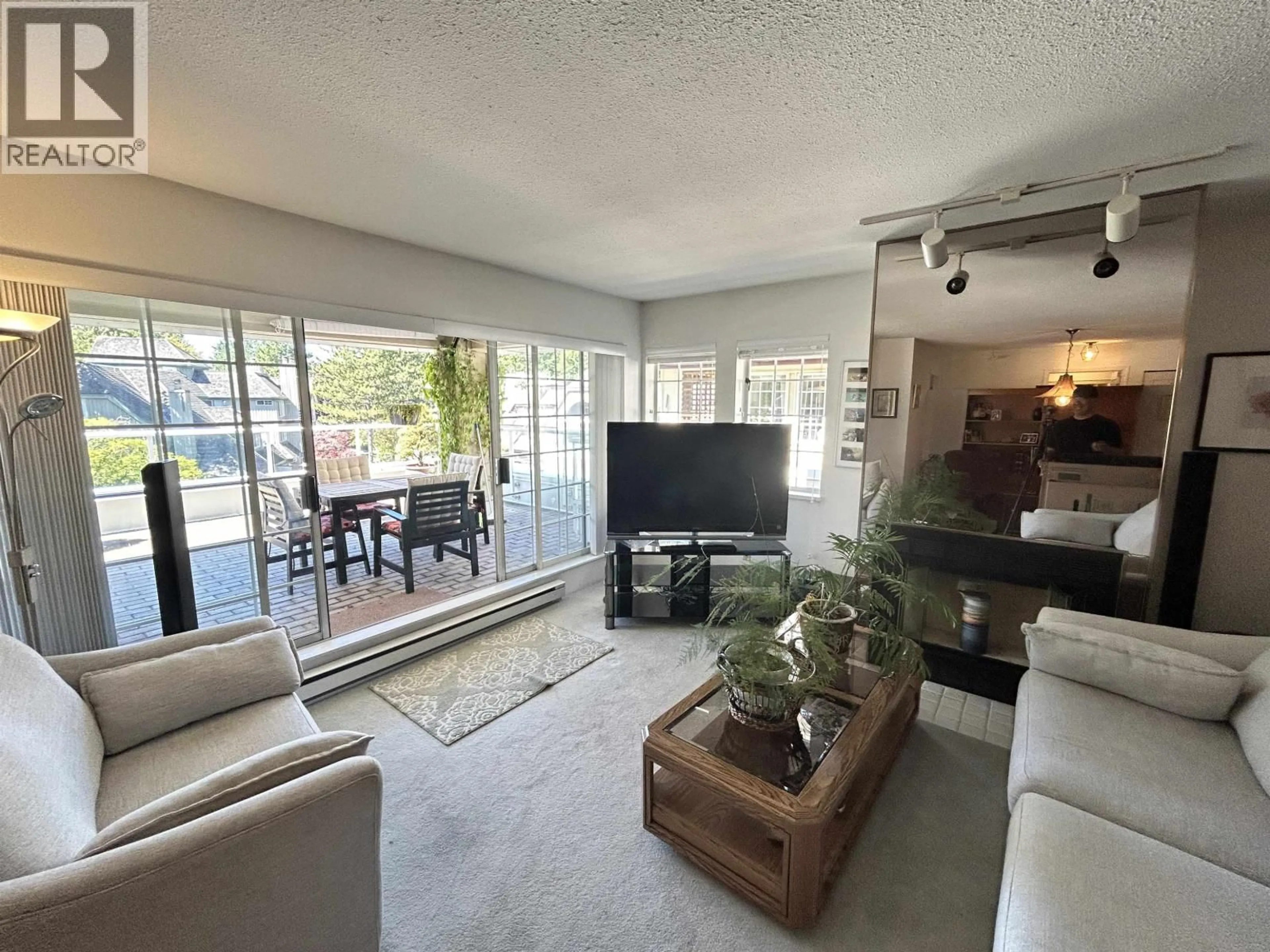 Living room with furniture, unknown for 201 - 3421 CURLE AVENUE, Burnaby British Columbia V5G4P4