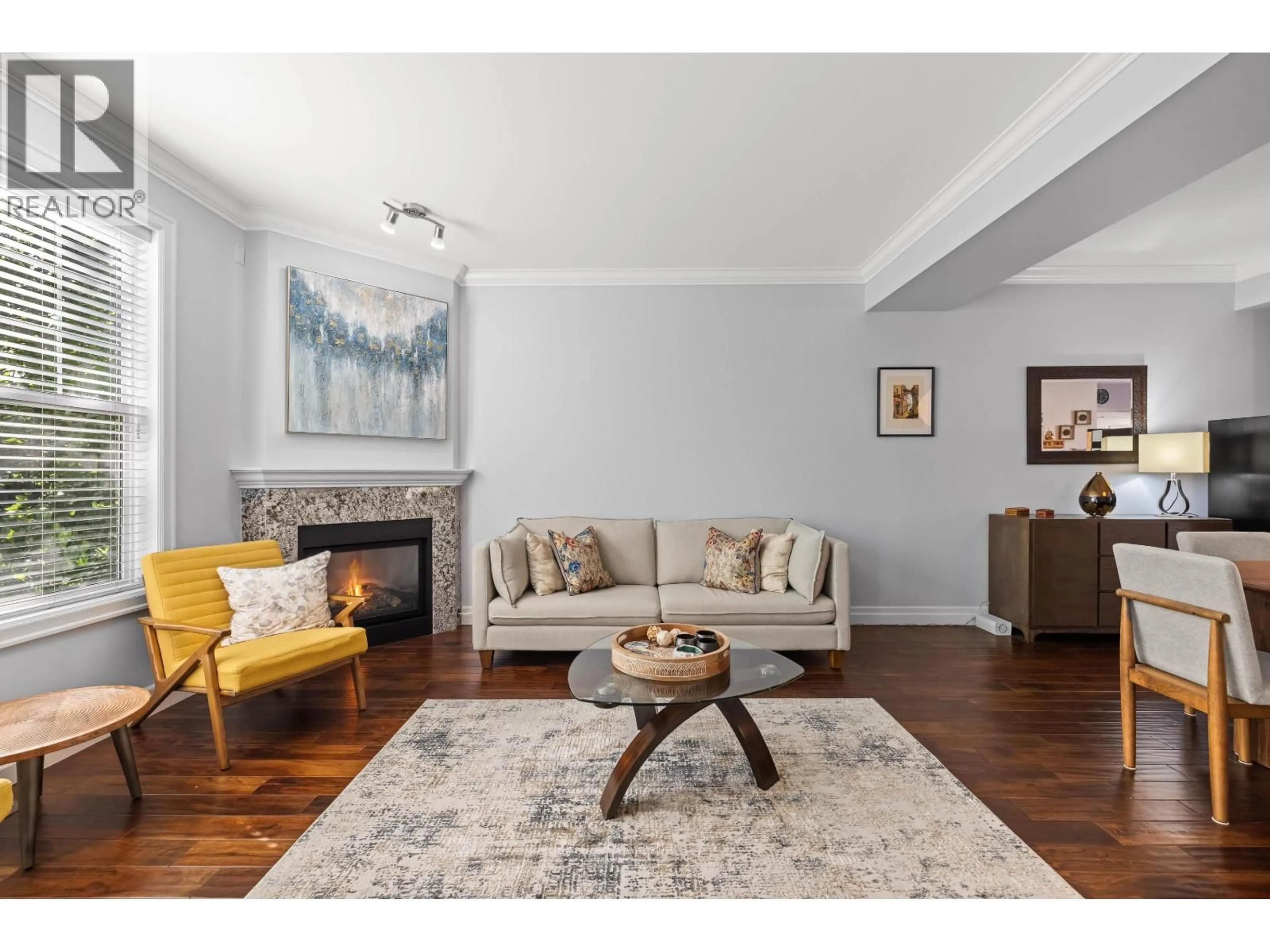 Living room with furniture, wood/laminate floor for 1240 COAST MERIDIAN ROAD, Coquitlam British Columbia V3B0E8