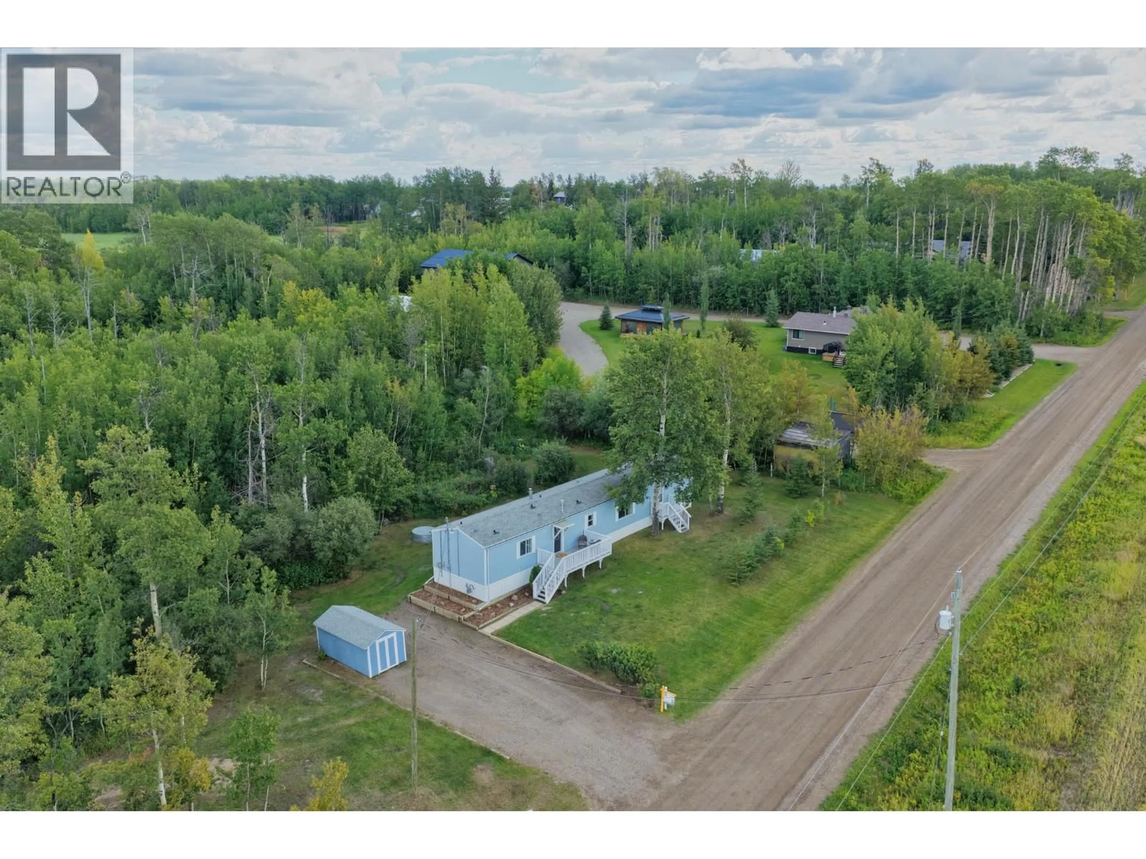 A pic from outside/outdoor area/front of a property/back of a property/a pic from drone, unknown for 11075 257 ROAD, Fort St. John British Columbia V1J8C2