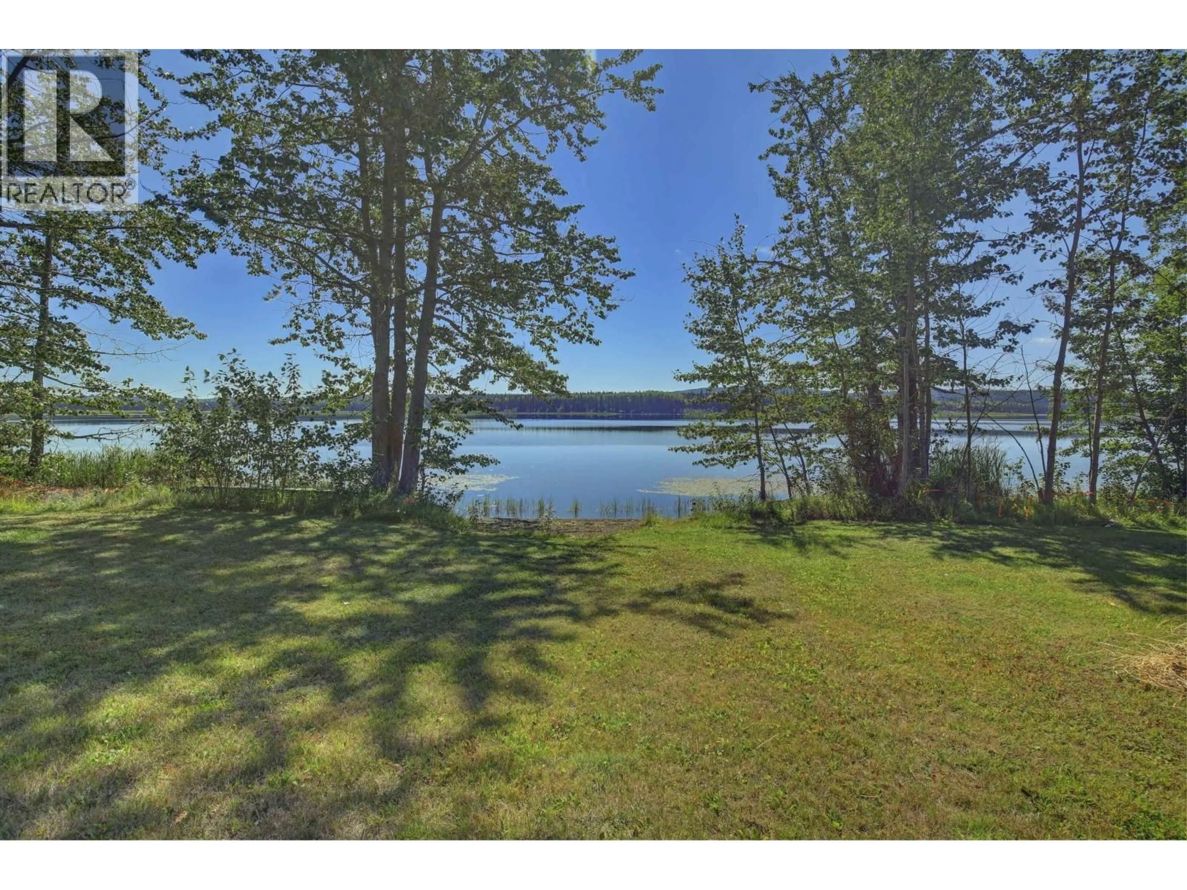 A pic from outside/outdoor area/front of a property/back of a property/a pic from drone, water/lake/river/ocean view for 3812 BRANCH DRIVE, 150 Mile House British Columbia V0K2G0