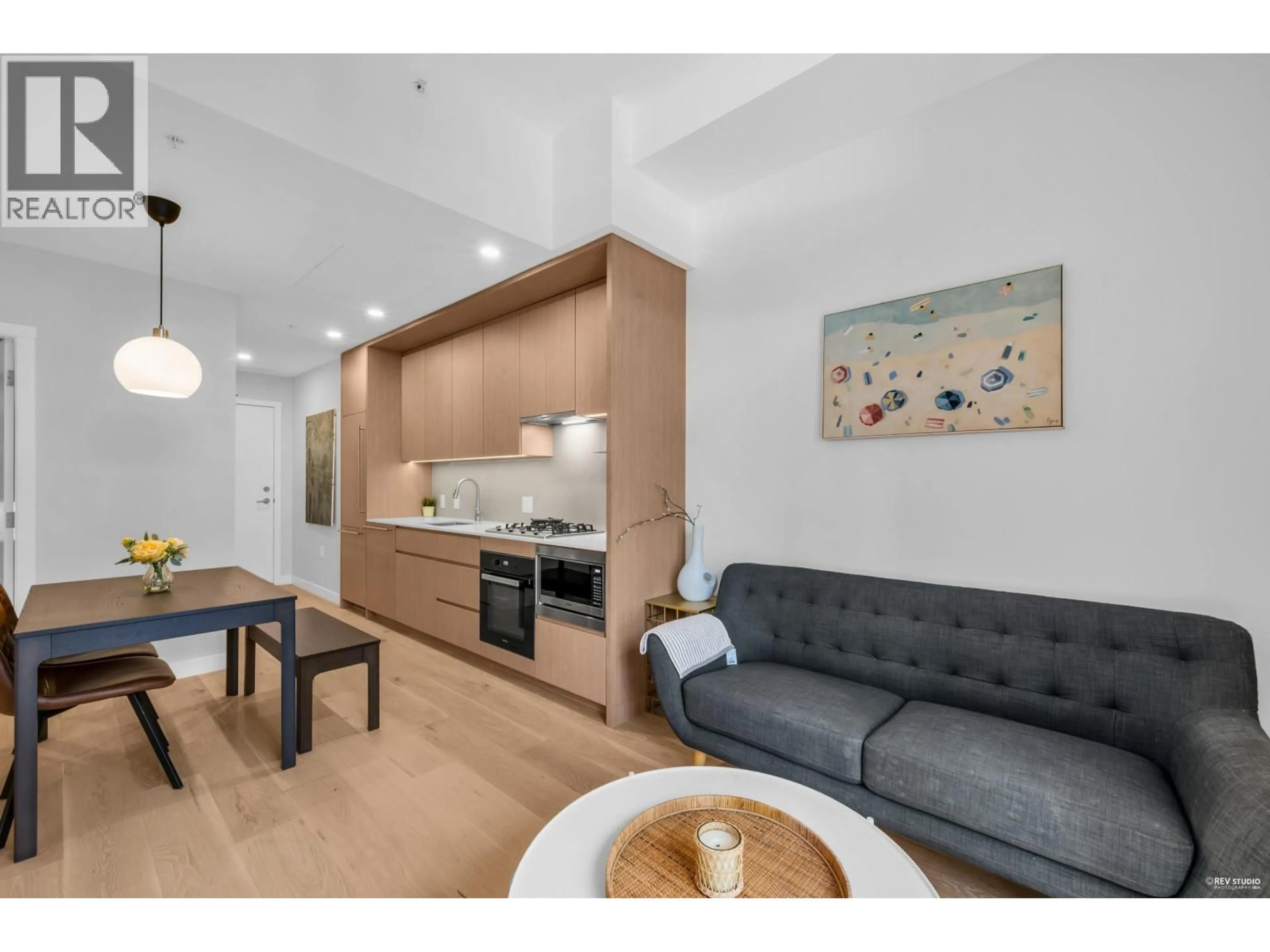 Open concept kitchen, wood/laminate floor for 104 - 5212 CAMBIE STREET, Vancouver British Columbia V5Z2Z7