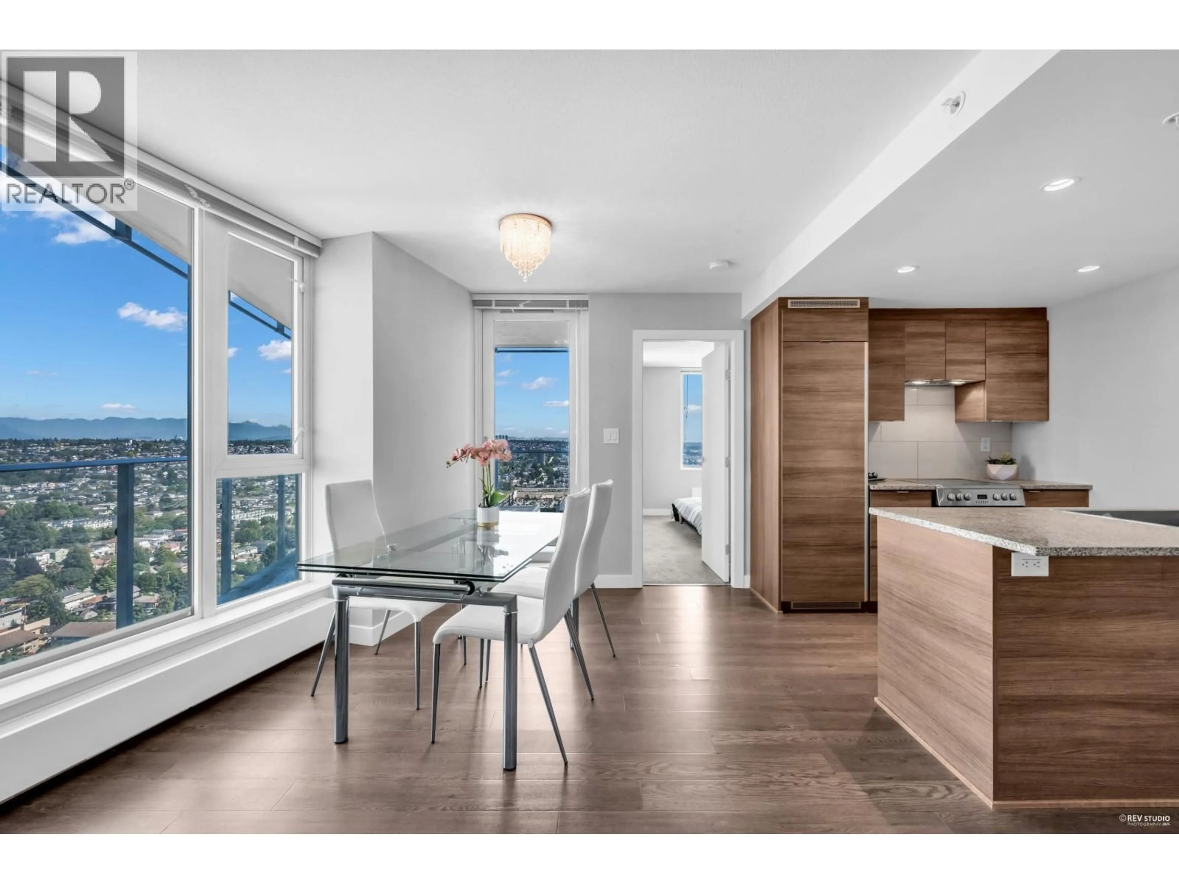 Open concept kitchen, wood/laminate floor for 3207 - 488 MARINE DRIVE, Vancouver British Columbia V5X0C6