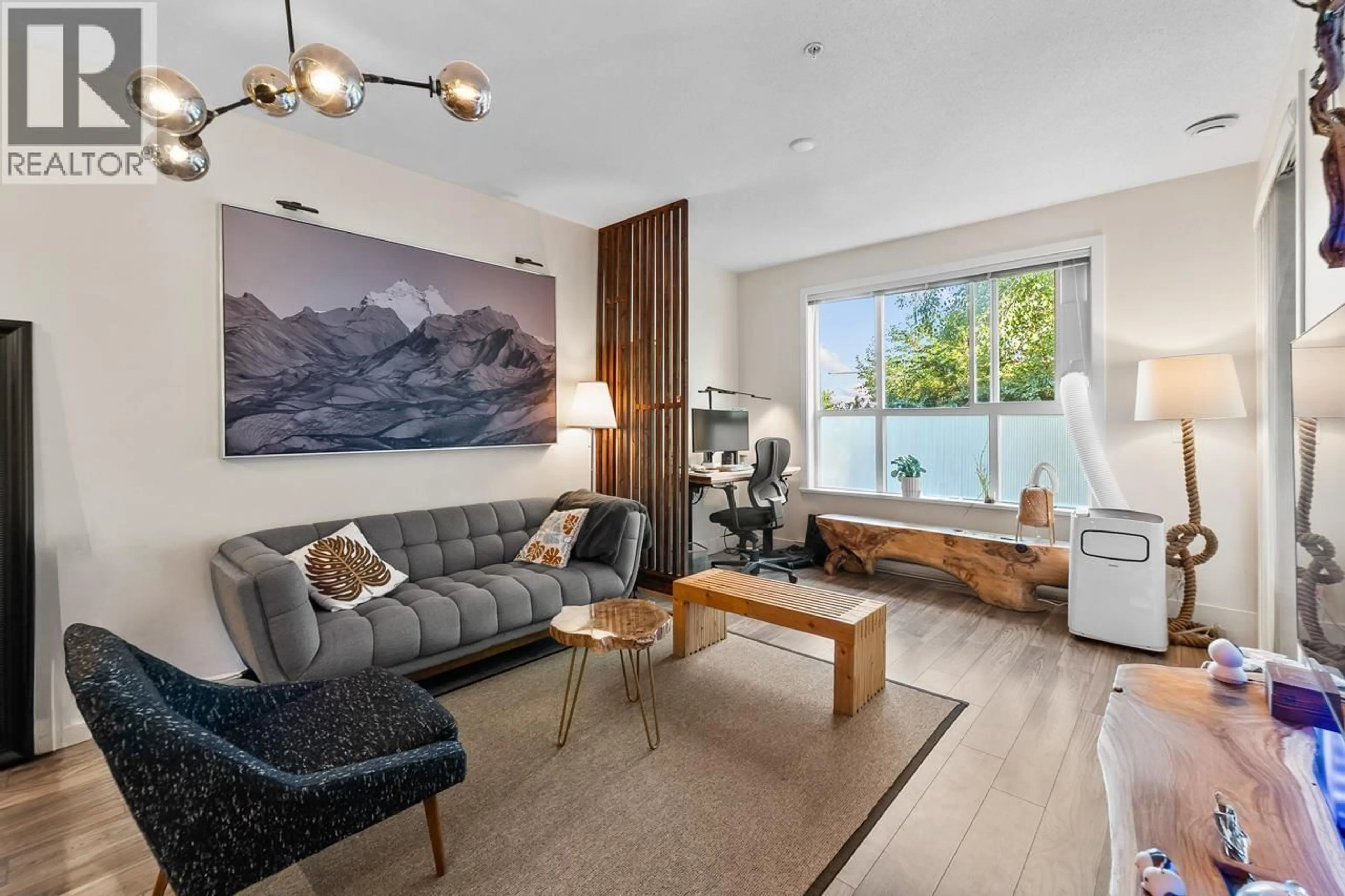 Living room with furniture, wood/laminate floor for 212 - 5788 SIDLEY STREET, Burnaby British Columbia V5J0E4