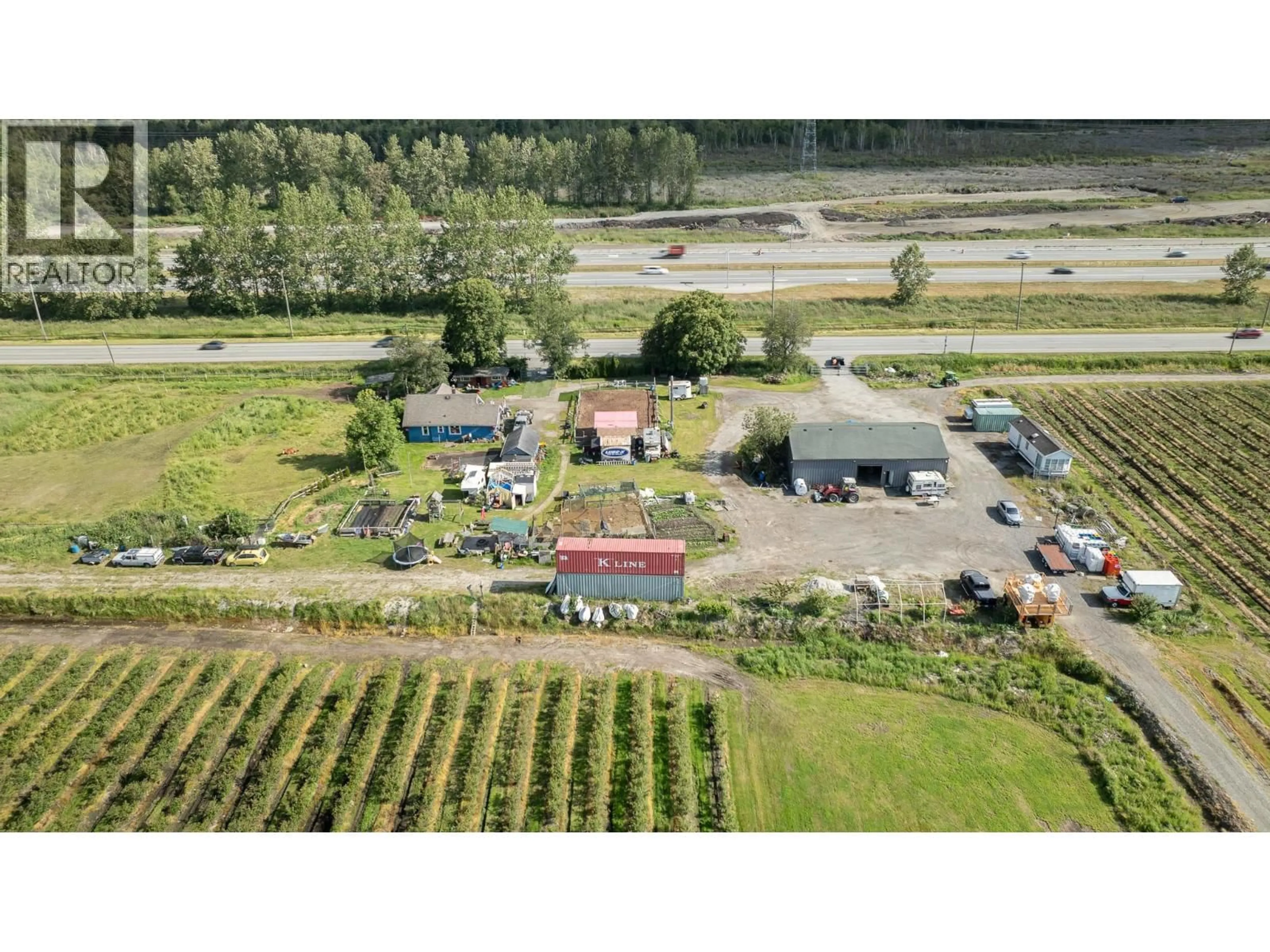 A pic from outside/outdoor area/front of a property/back of a property/a pic from drone, unknown for 8442 LADNER TRUNK ROAD, Delta British Columbia V4K3N3