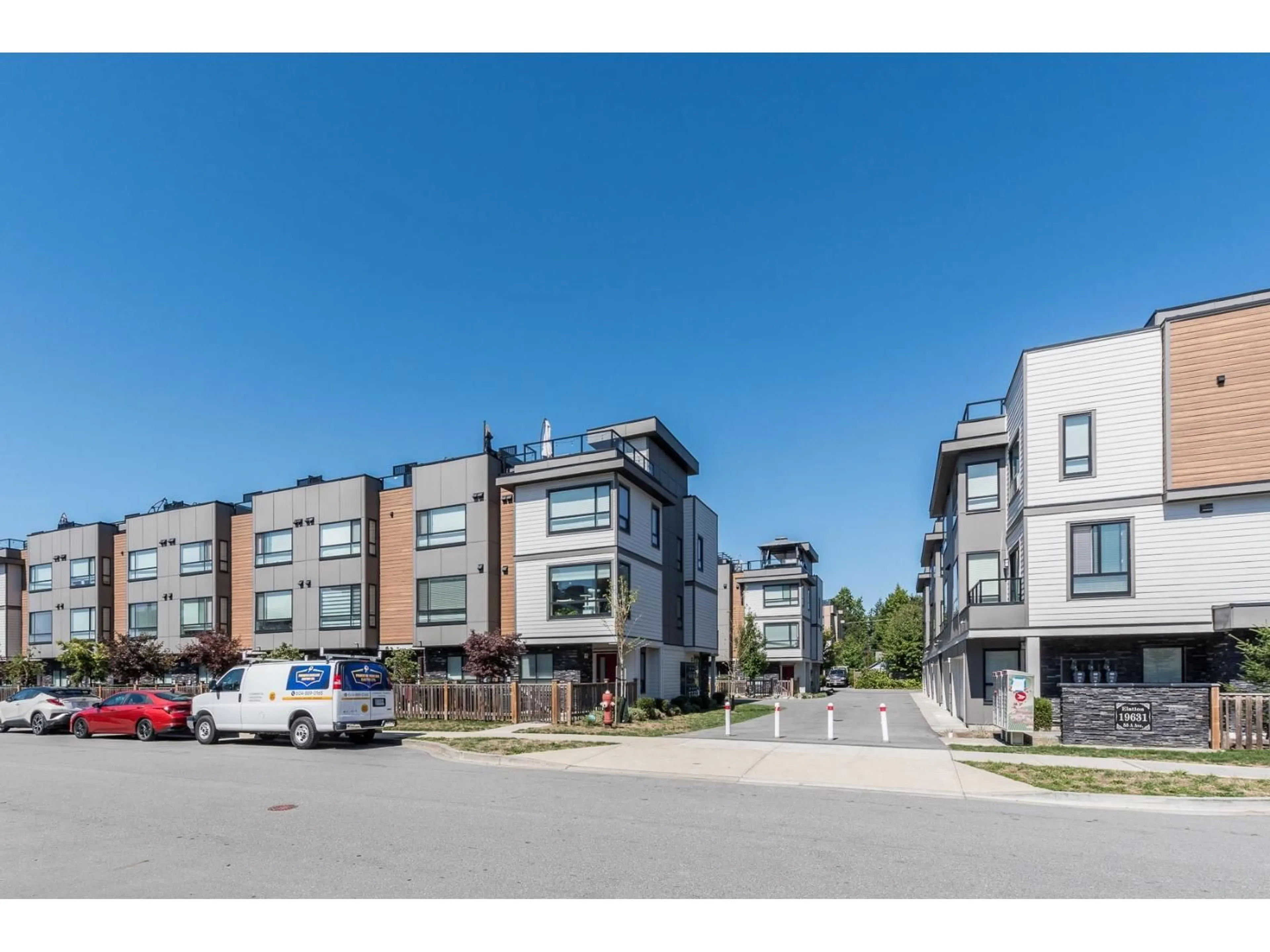 A pic from outside/outdoor area/front of a property/back of a property/a pic from drone, street for 8 - 19631 55A, Langley British Columbia V3A3X1