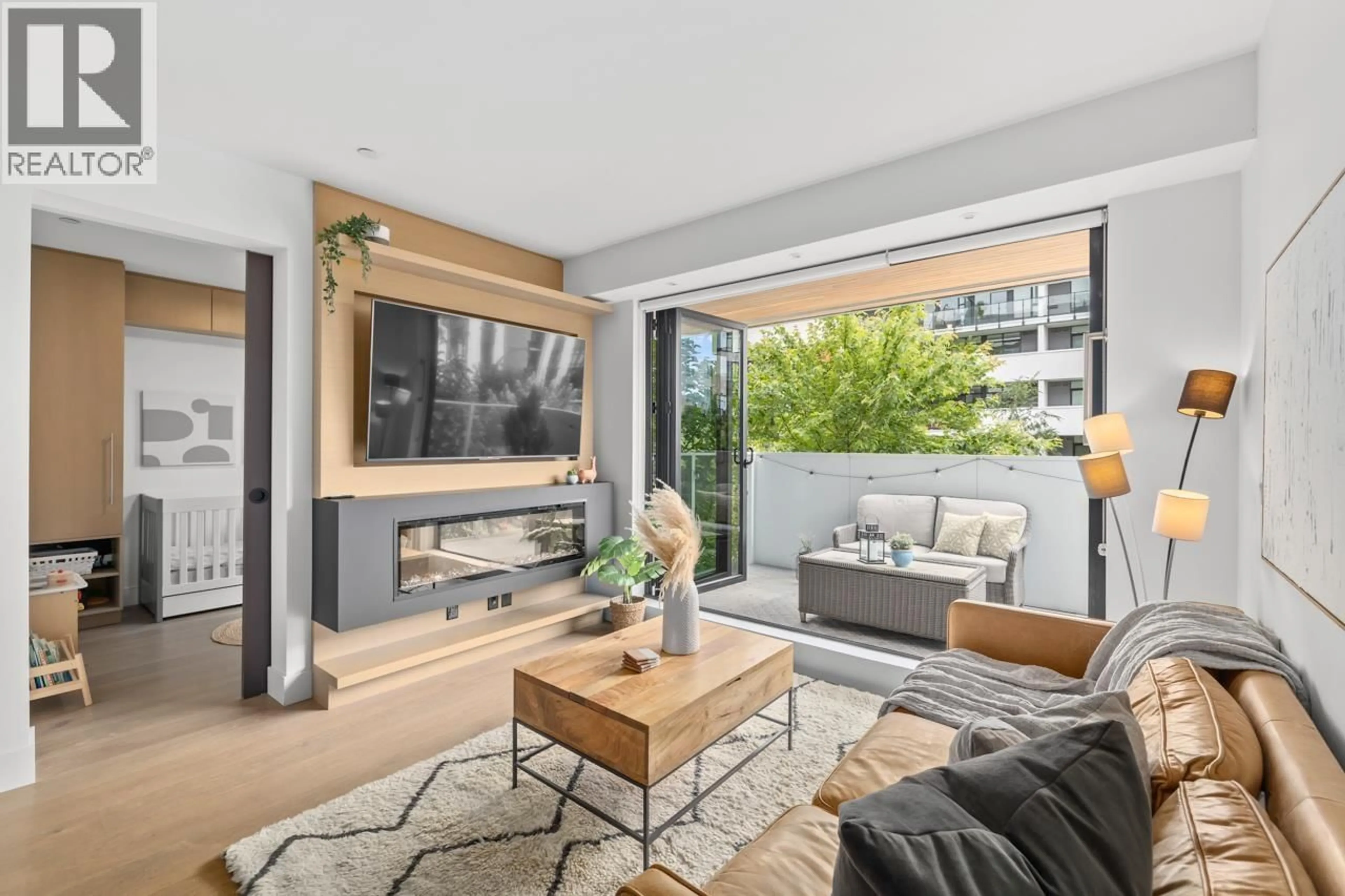 Living room with furniture, unknown for 205 - 5089 QUEBEC STREET, Vancouver British Columbia V5W0E5
