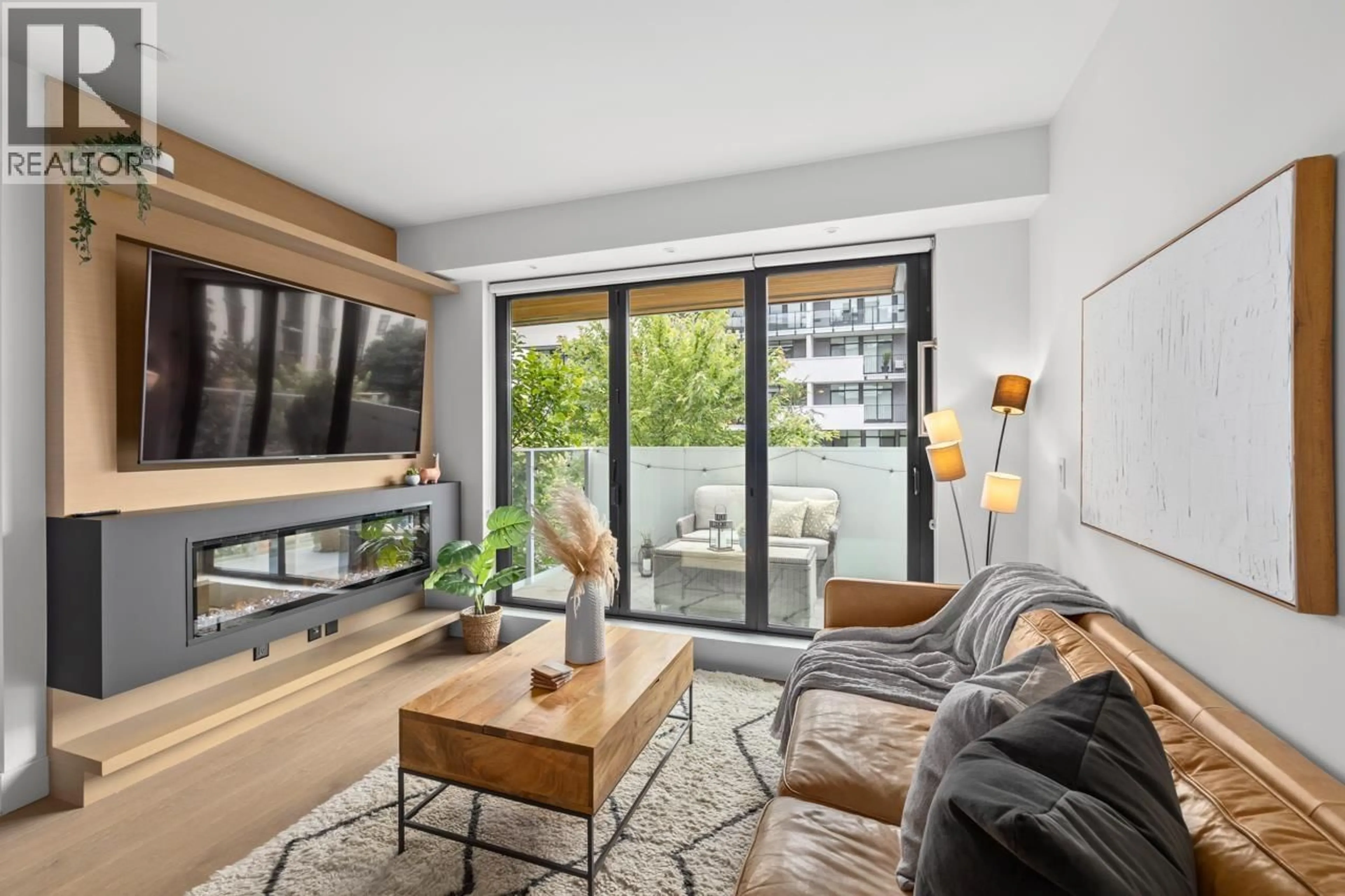 Living room with furniture, unknown for 205 - 5089 QUEBEC STREET, Vancouver British Columbia V5W0E5