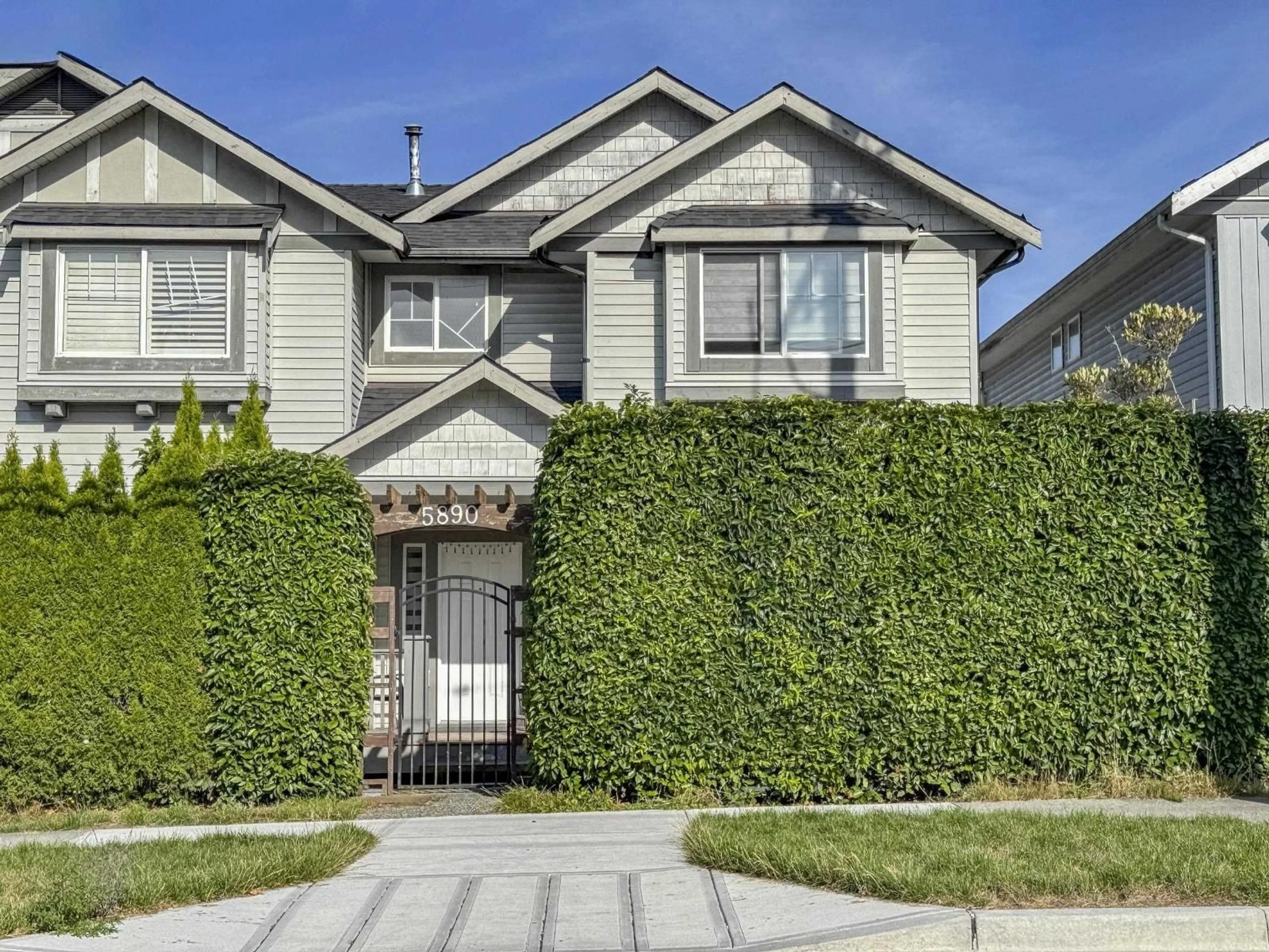 Home with vinyl exterior material, street for 5890 148, Surrey British Columbia V3S3B8