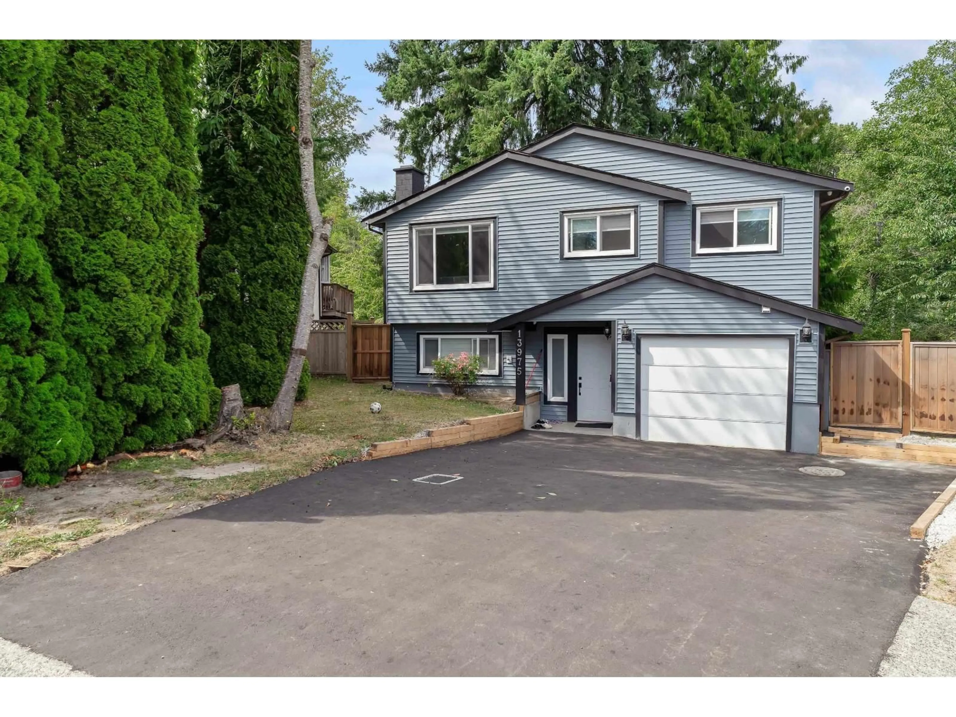 Home with vinyl exterior material, street for 13975 80B, Surrey British Columbia V3W6P7
