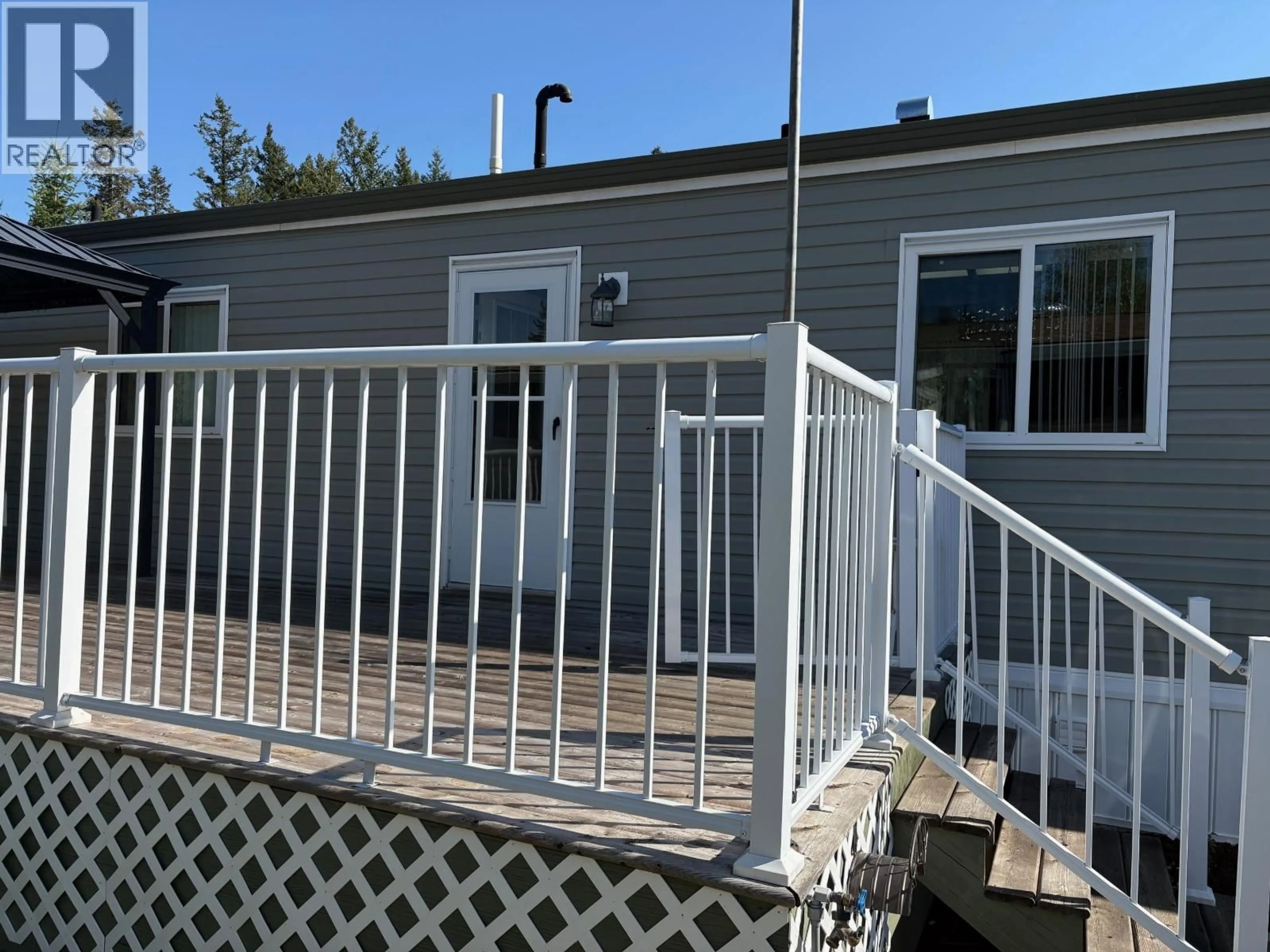Home with vinyl exterior material, unknown for 54 - 208 8TH STREET, 100 Mile House British Columbia V0K2E3