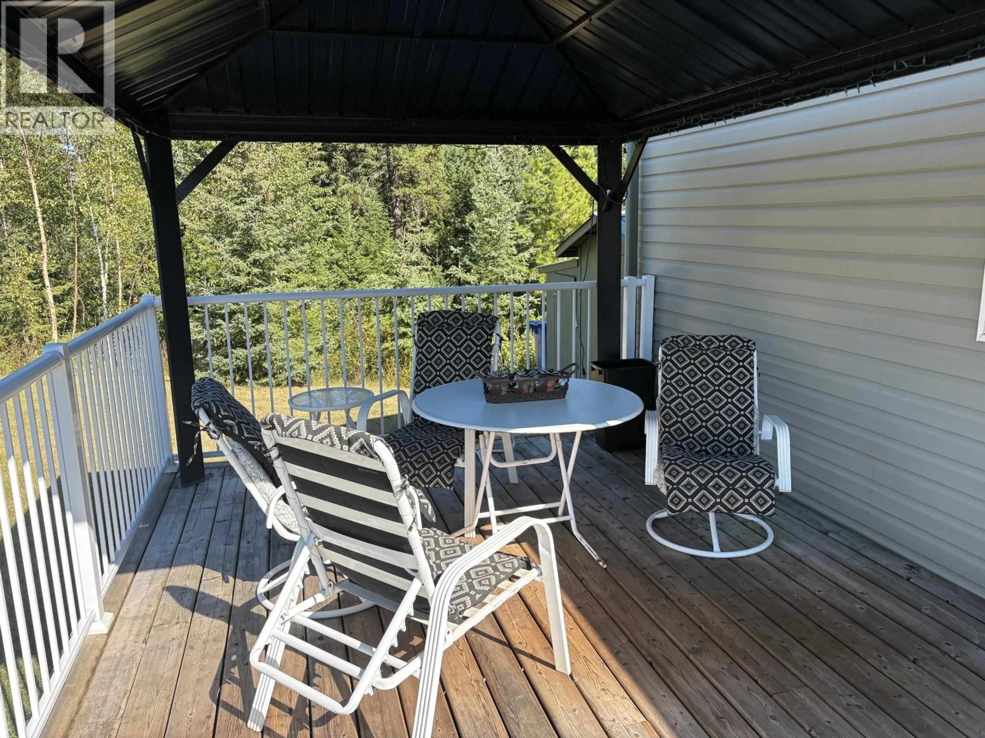Patio, water/lake/river/ocean view for 54 - 208 8TH STREET, 100 Mile House British Columbia V0K2E3