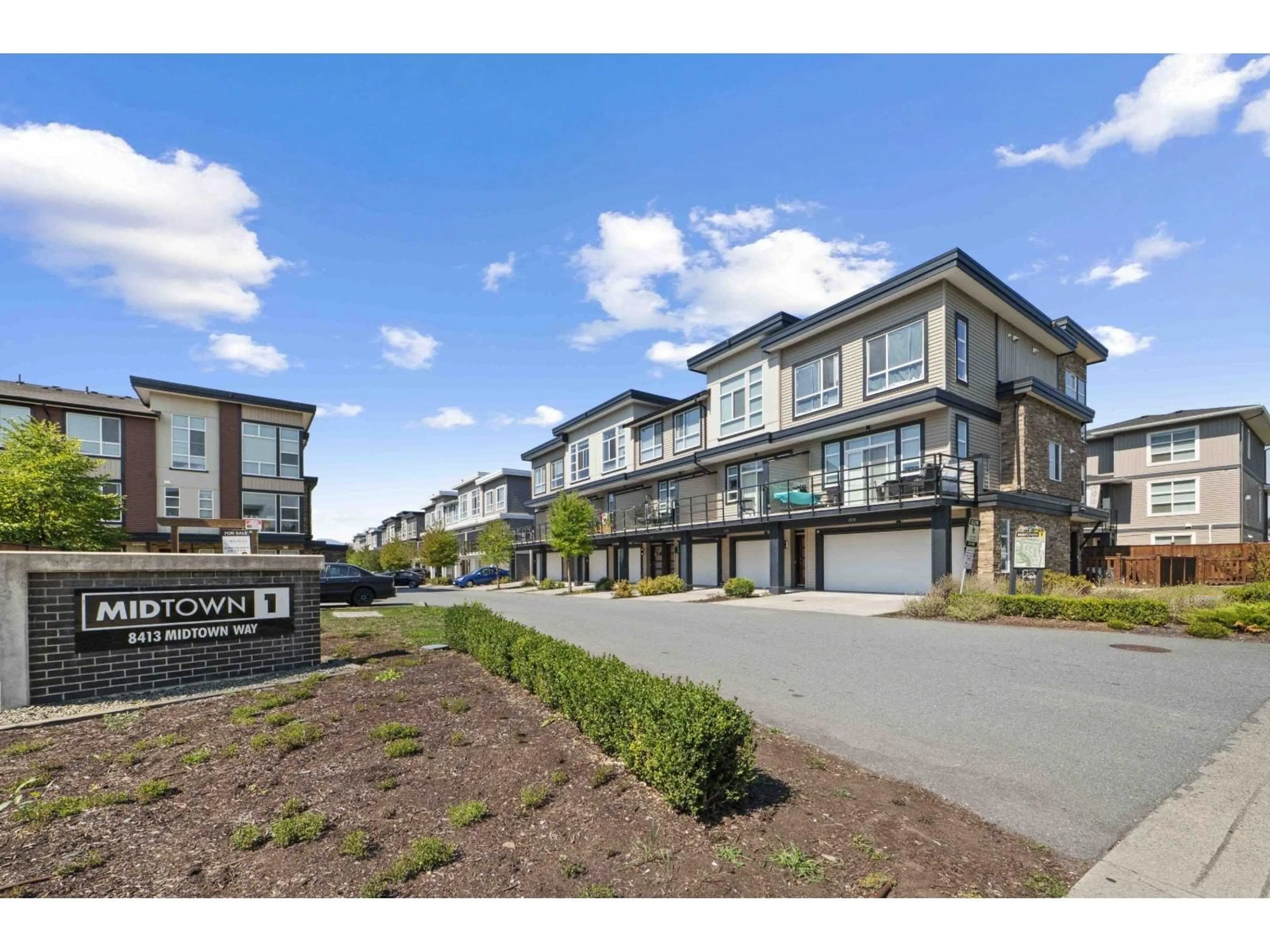 A pic from outside/outdoor area/front of a property/back of a property/a pic from drone, street for 106 - 8413 MIDTOWN WAY, Chilliwack British Columbia V2P0G7