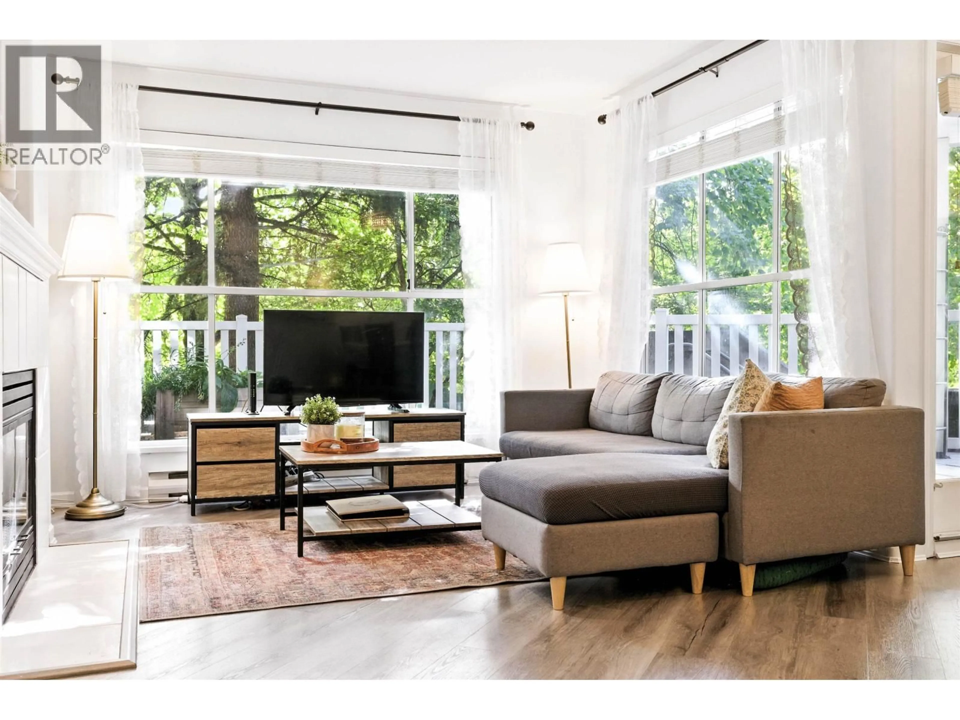 Living room with furniture, wood/laminate floor for 143 - 8880 JONES ROAD, Richmond British Columbia V6Y3Z1
