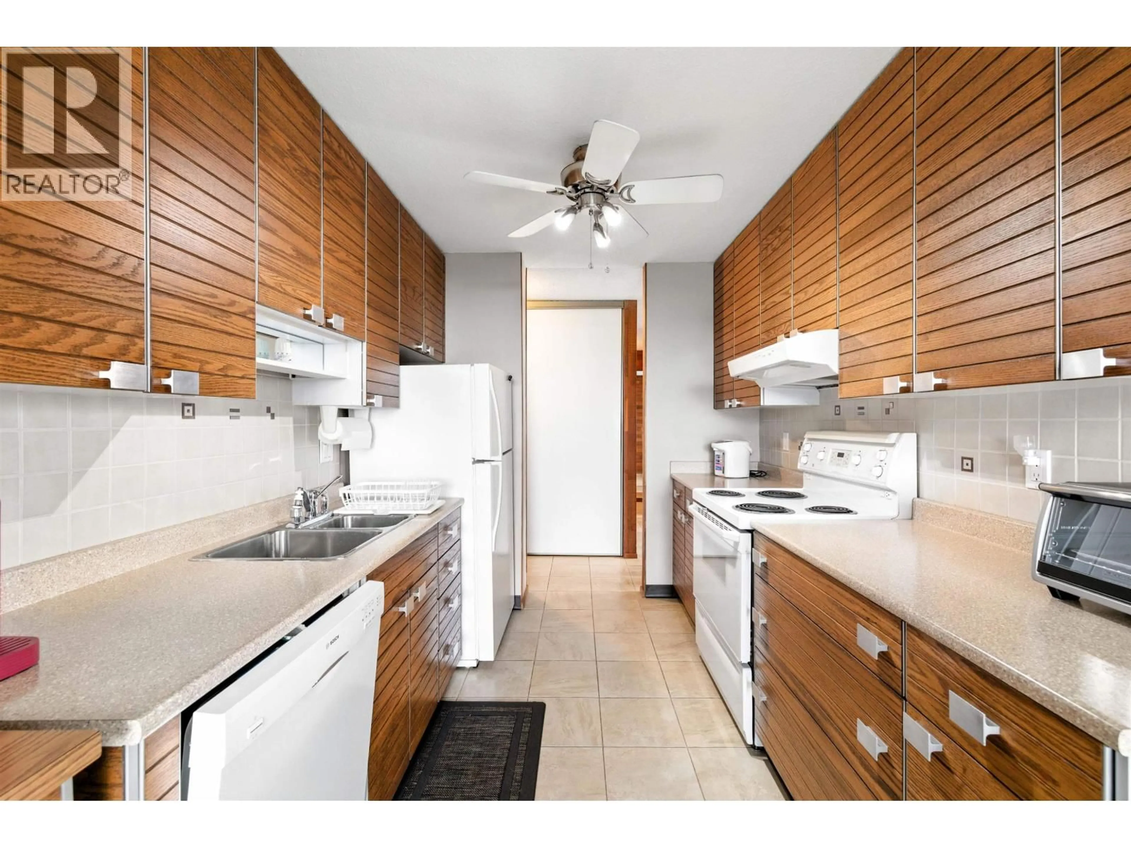 Standard kitchen, wood/laminate floor for 2403 - 3737 BARTLETT COURT, Burnaby British Columbia V3J7E3