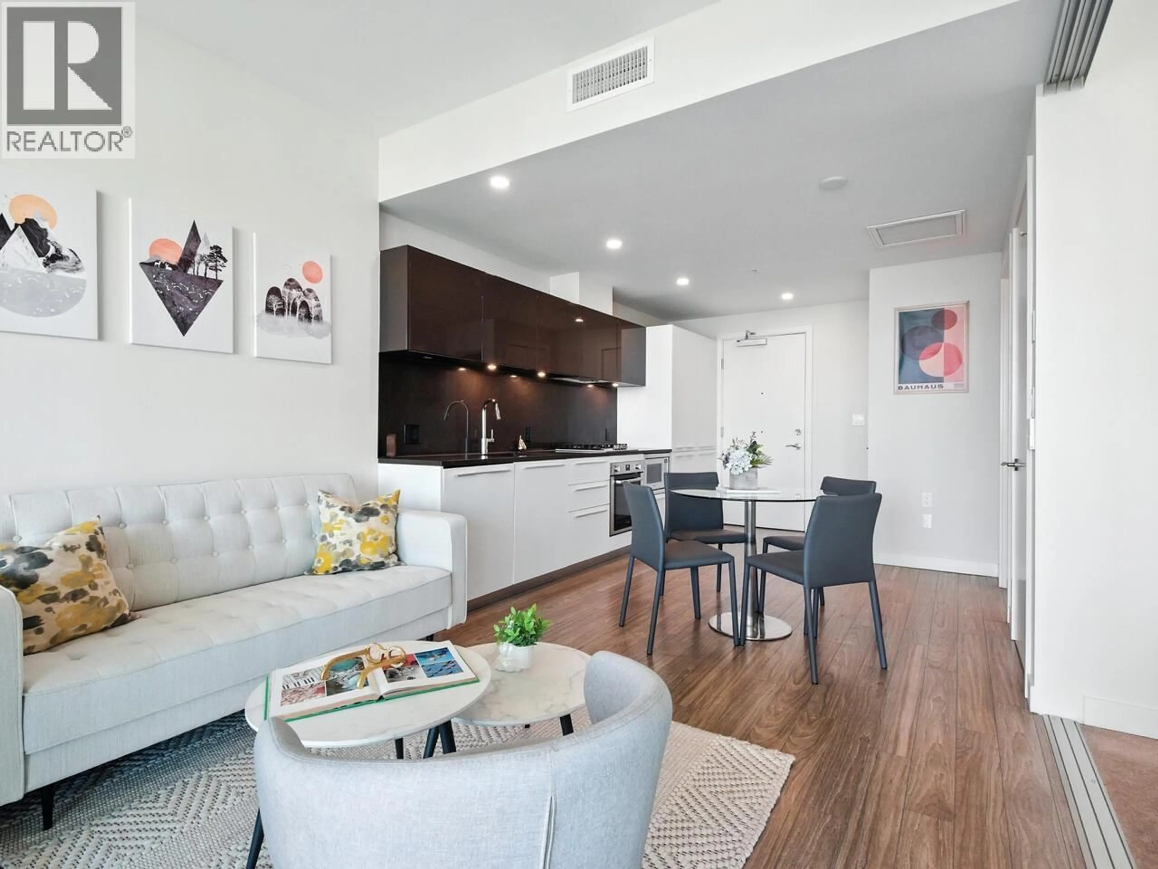 Living room with furniture, wood/laminate floor for 1201 - 6383 MCKAY AVENUE, Burnaby British Columbia V5H0H8