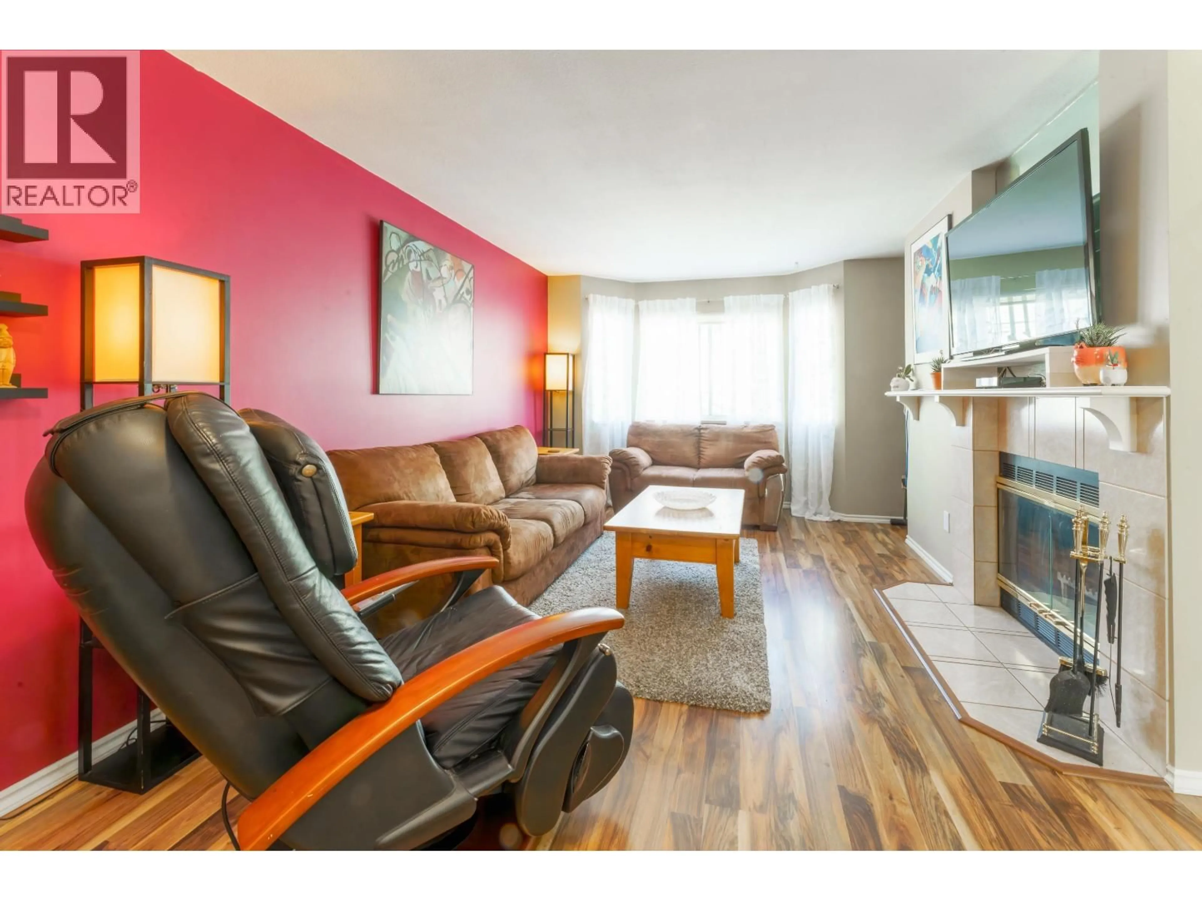 Living room with furniture, wood/laminate floor for 11 - 2352 PITT RIVER ROAD, Port Coquitlam British Columbia V3C5Y2