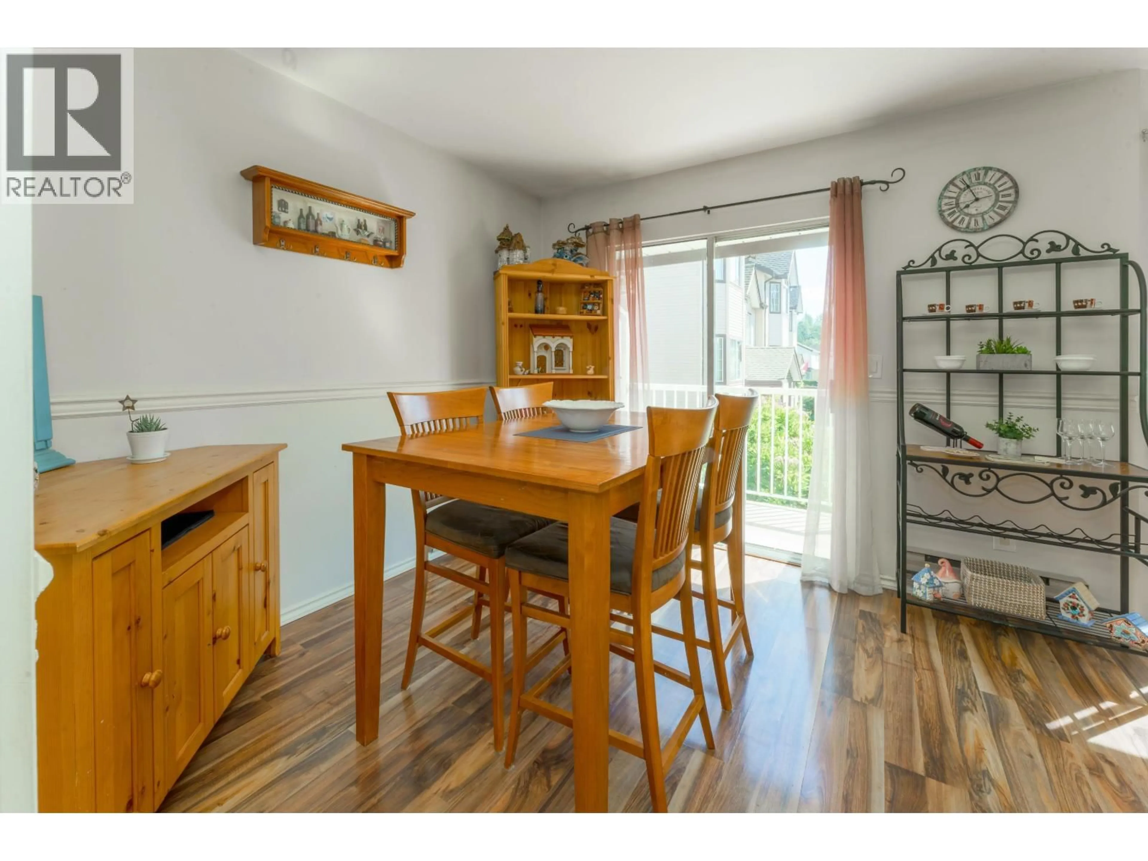 Dining room, wood/laminate floor for 11 - 2352 PITT RIVER ROAD, Port Coquitlam British Columbia V3C5Y2