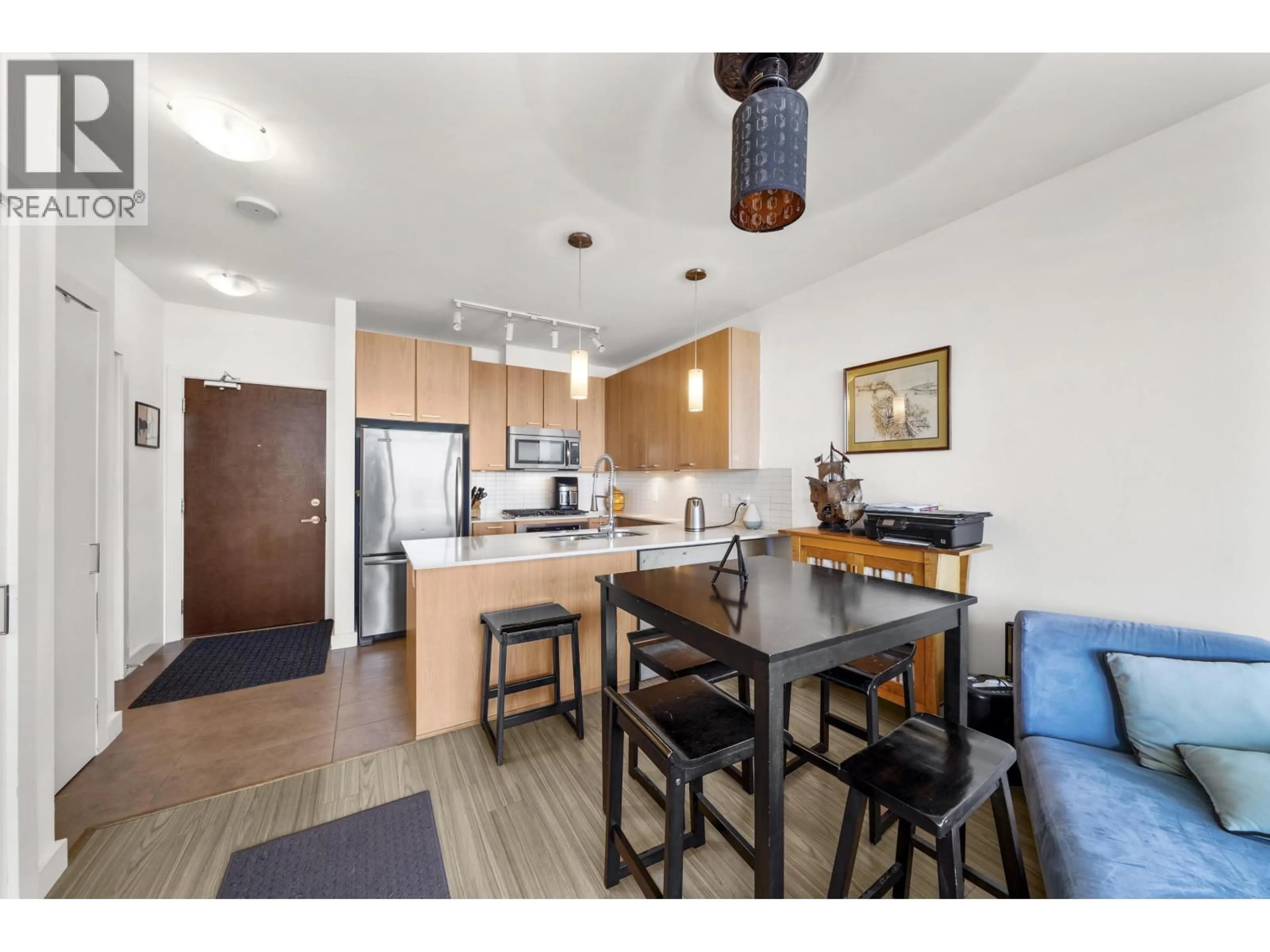 Open concept kitchen, wood/laminate floor for 907 - 2789 SHAUGHNESSY STREET, Port Coquitlam British Columbia V3C3G9