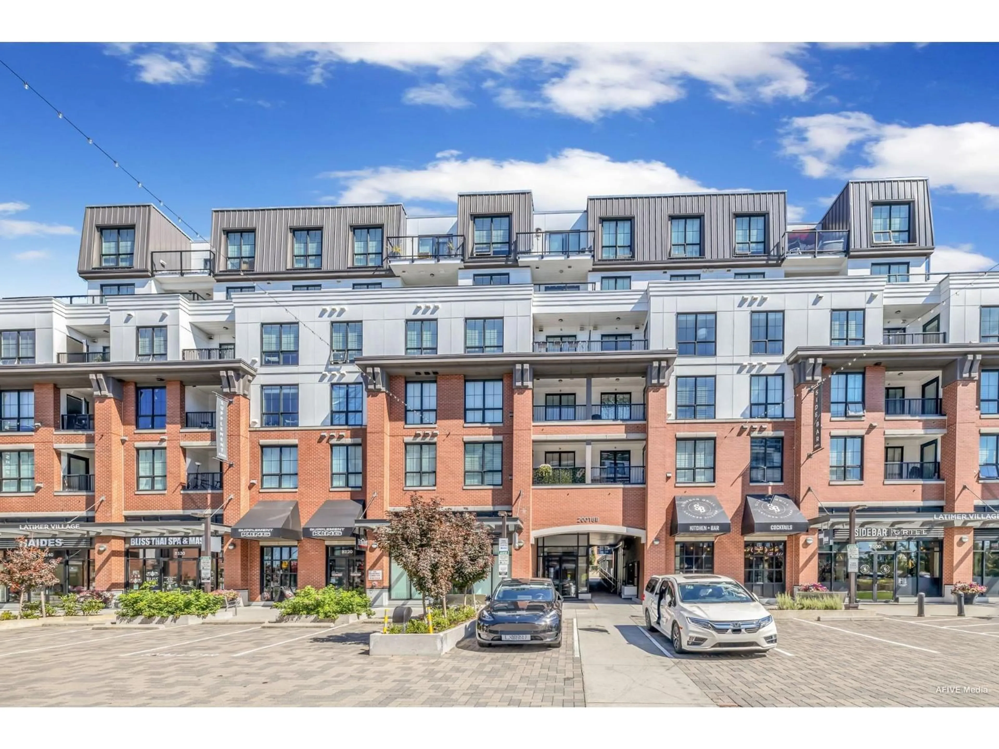 A pic from outside/outdoor area/front of a property/back of a property/a pic from drone, street for B601 - 20018 83A, Langley British Columbia V2Y3P3