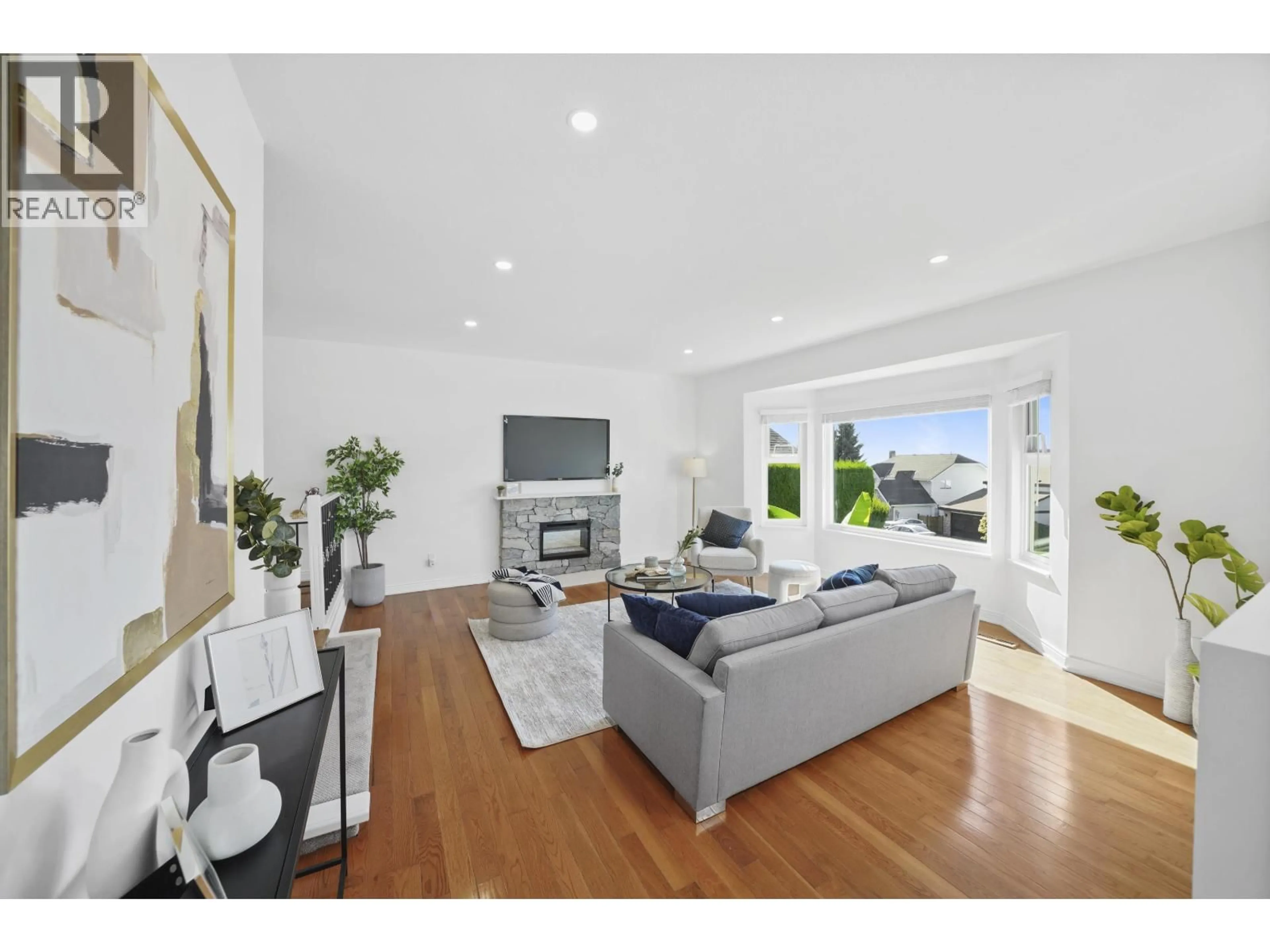 Living room with furniture, wood/laminate floor for 2541 BLUEBELL AVENUE, Coquitlam British Columbia V3E2H5