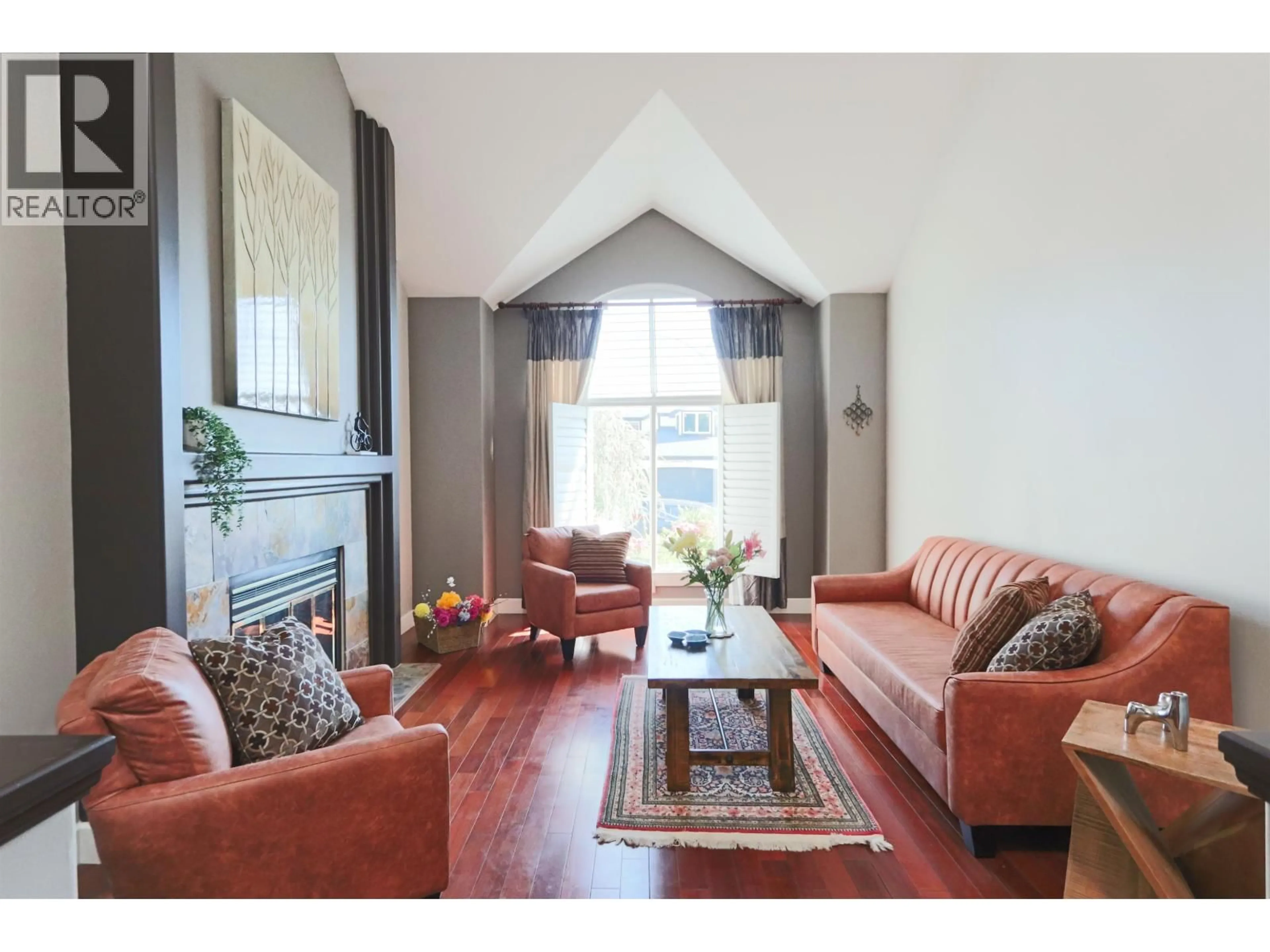Living room with furniture, wood/laminate floor for 1516 TANGLEWOOD LANE, Coquitlam British Columbia V3E2V2