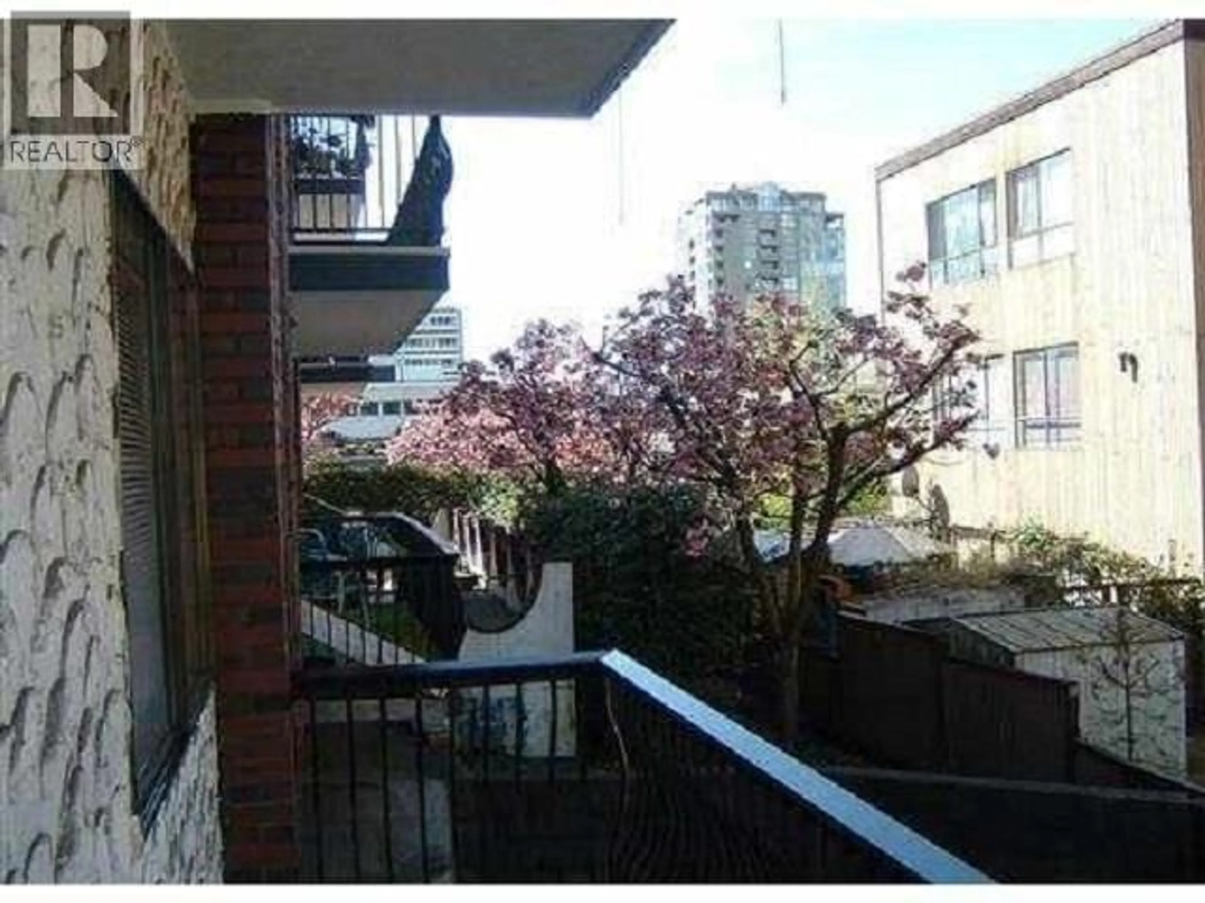 Balcony in the apartment, city buildings view from balcony for 103 - 214 15TH STREET, North Vancouver British Columbia V7L2R3