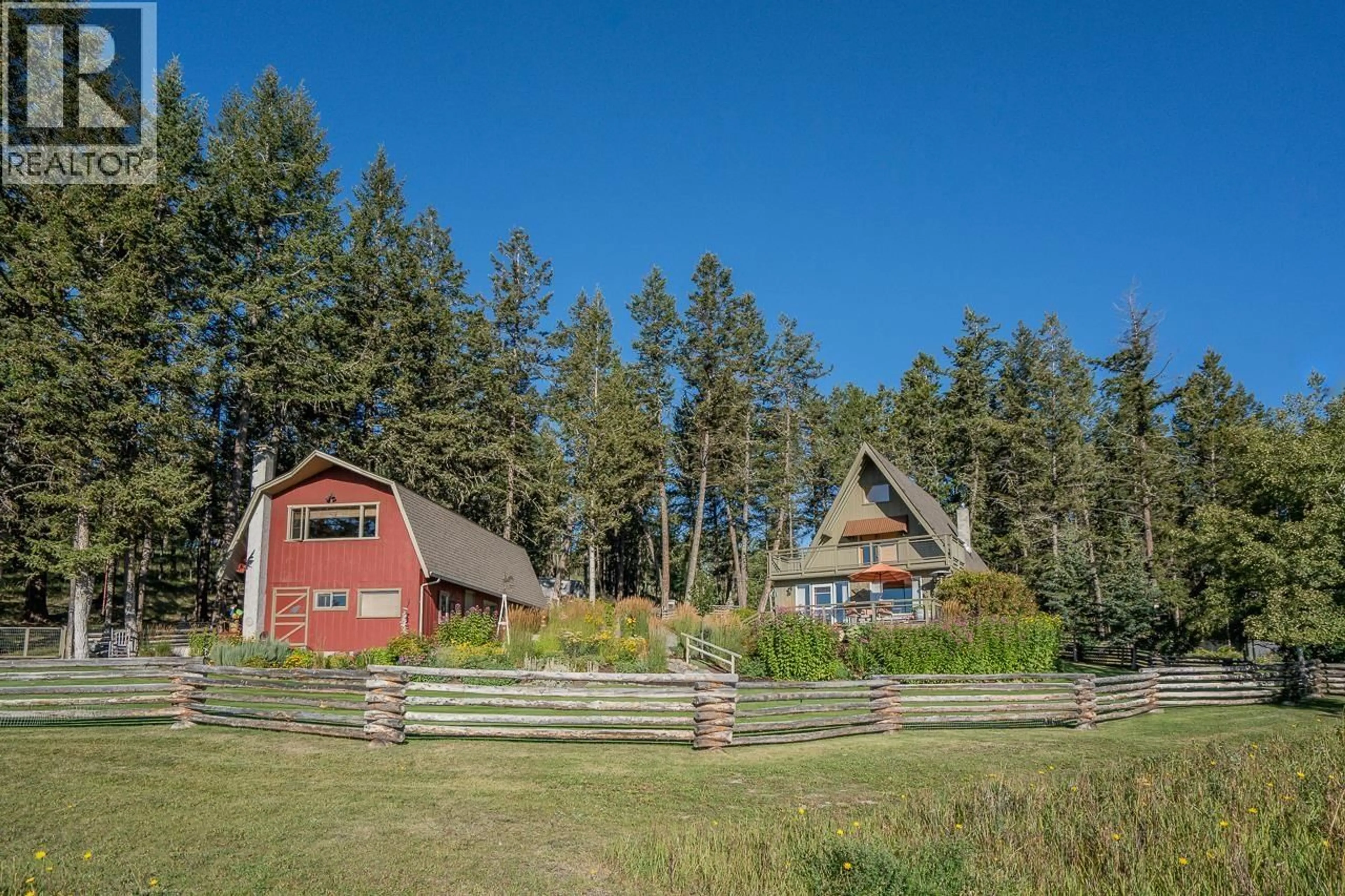 A pic from outside/outdoor area/front of a property/back of a property/a pic from drone, mountain view for 5058 BLOCK DRIVE, 108 Mile Ranch British Columbia V0K2Z0