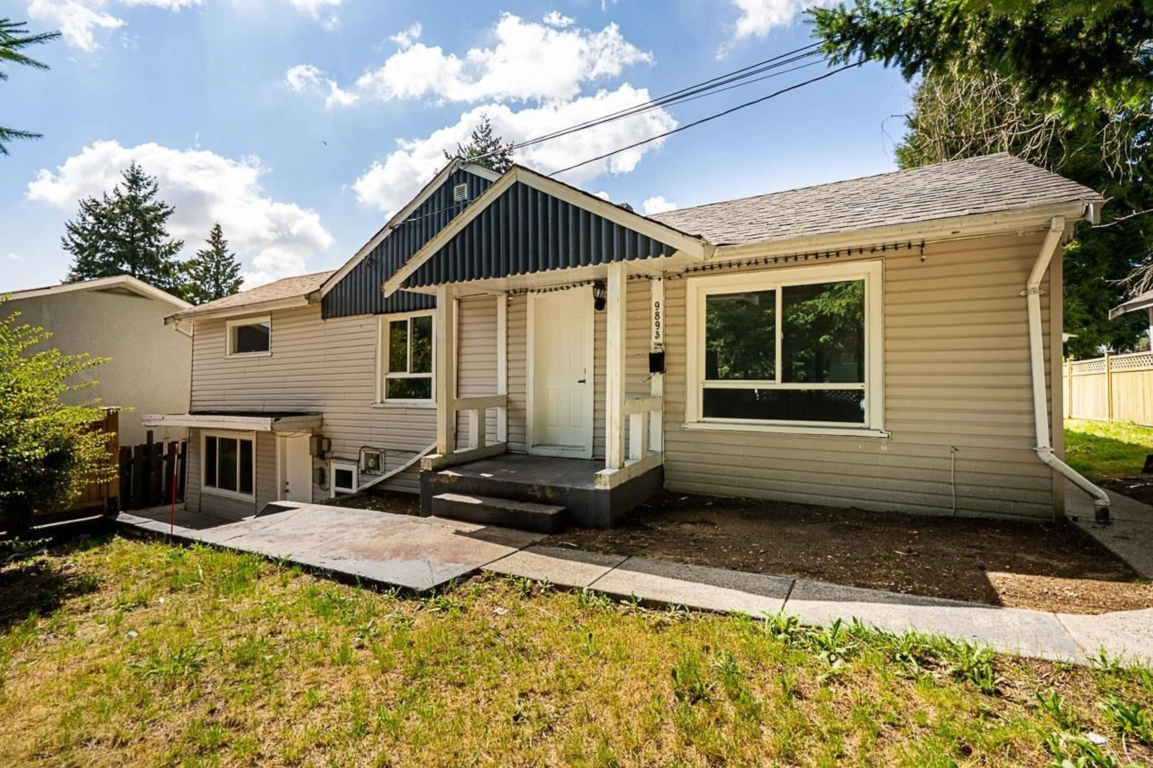 Home with vinyl exterior material, street for 9893 132, Surrey British Columbia V3T3S7