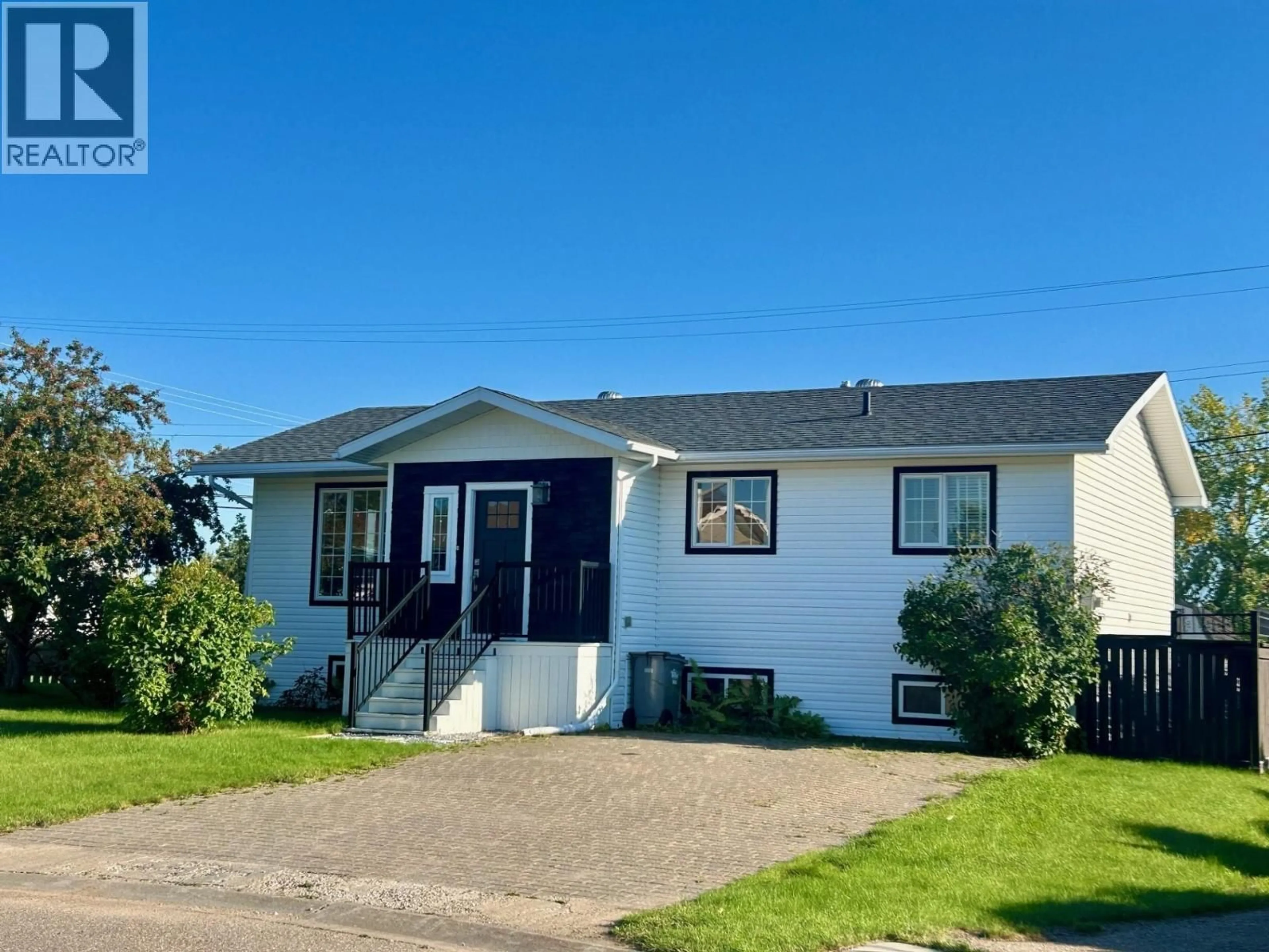 Home with vinyl exterior material, street for 5611 ANGUS COURT, Fort Nelson British Columbia V0C1R0