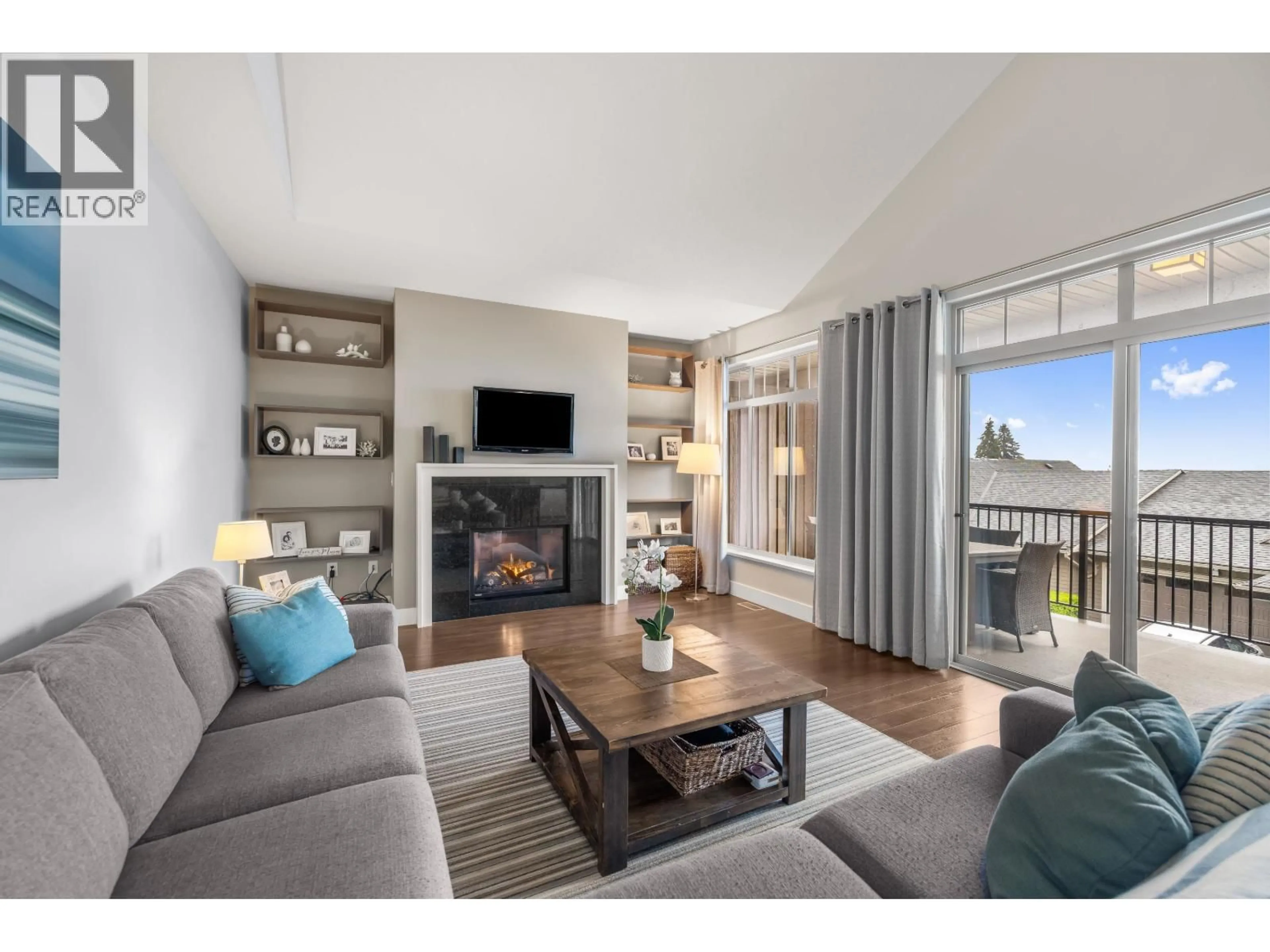 Living room with furniture, wood/laminate floor for 118 - 3467 GISLASON AVENUE, Coquitlam British Columbia V3E0H9