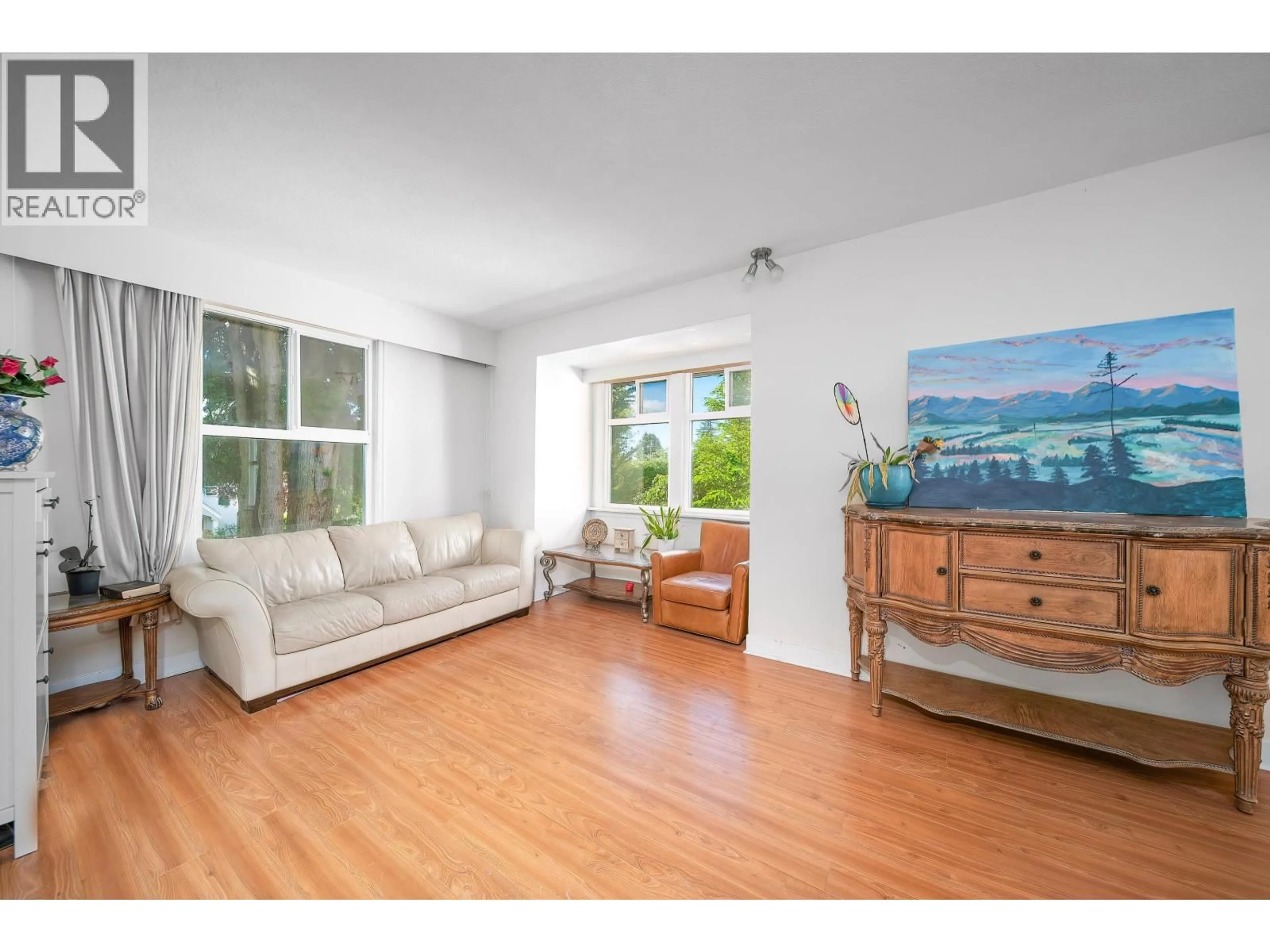 Living room with furniture, wood/laminate floor for 1623 66TH AVENUE, Vancouver British Columbia V6P2S1