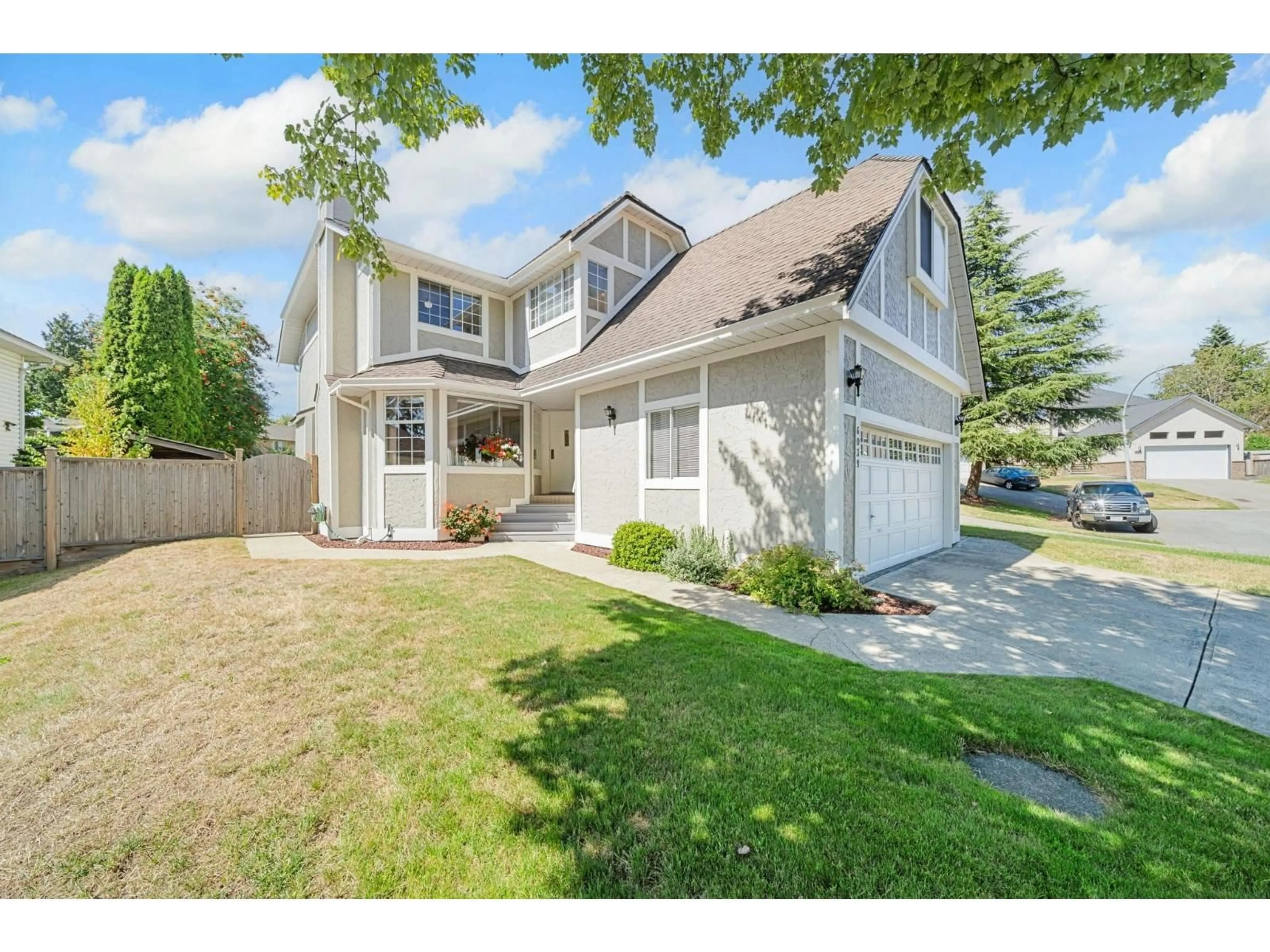 Home with vinyl exterior material, street for 6039 191A, Surrey British Columbia V3S8A1