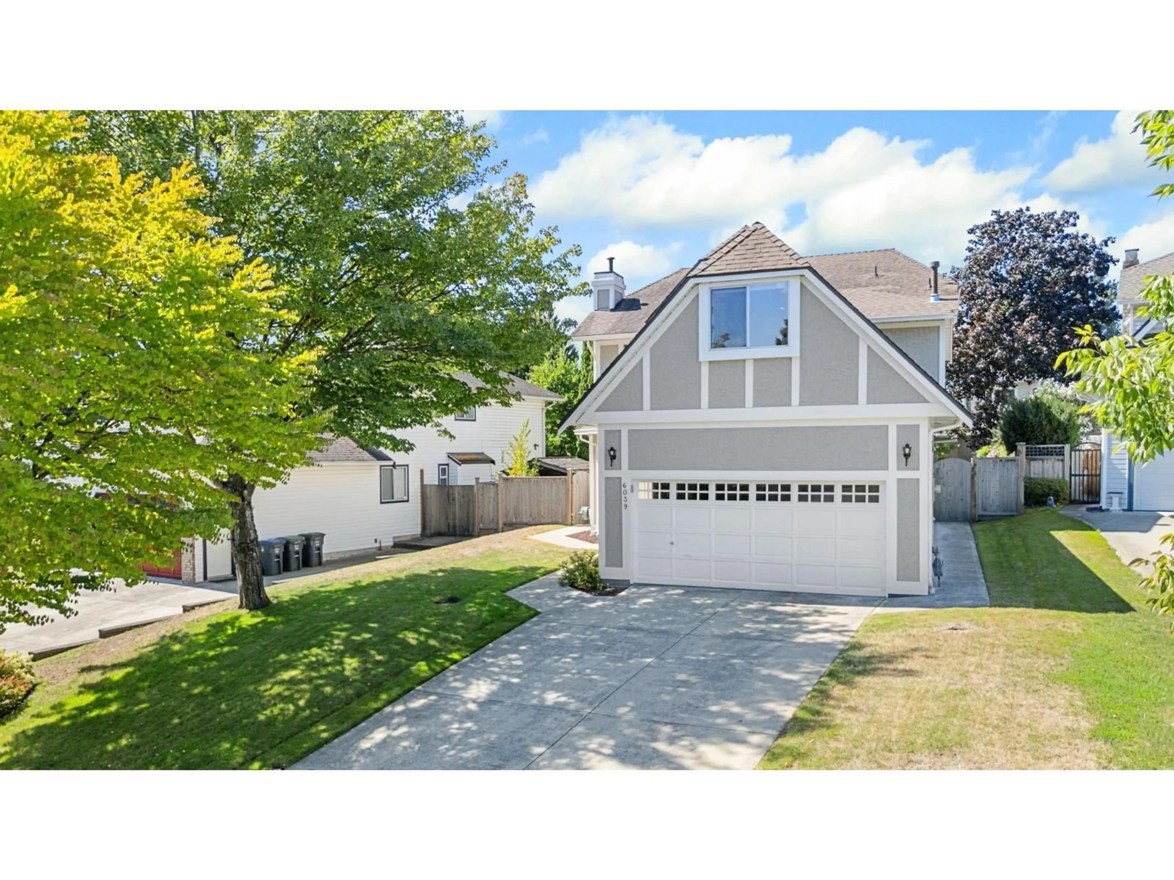 Home with vinyl exterior material, street for 6039 191A, Surrey British Columbia V3S8A1