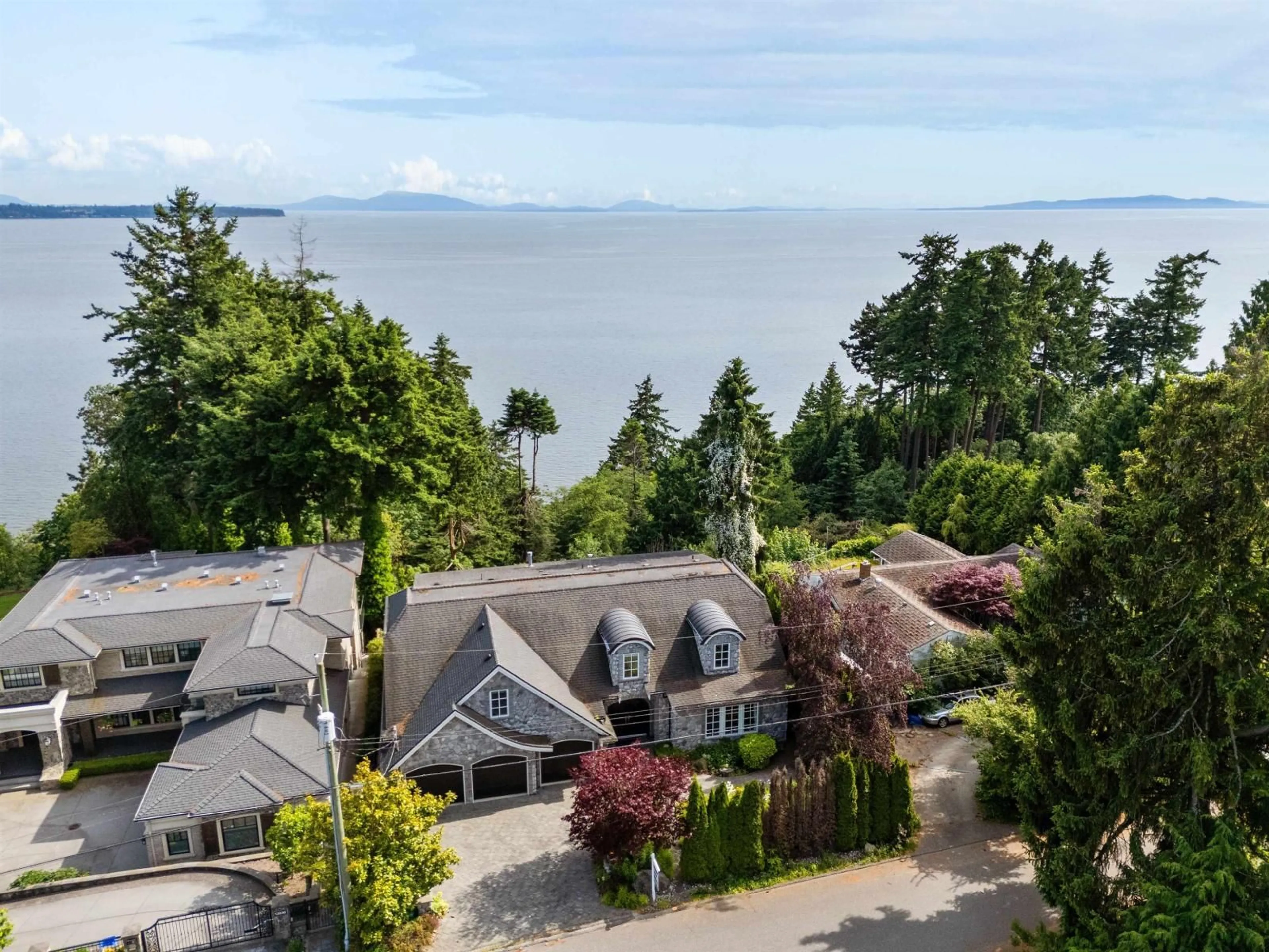A pic from outside/outdoor area/front of a property/back of a property/a pic from drone, water/lake/river/ocean view for 13922 TERRY, White Rock British Columbia V4B1A2