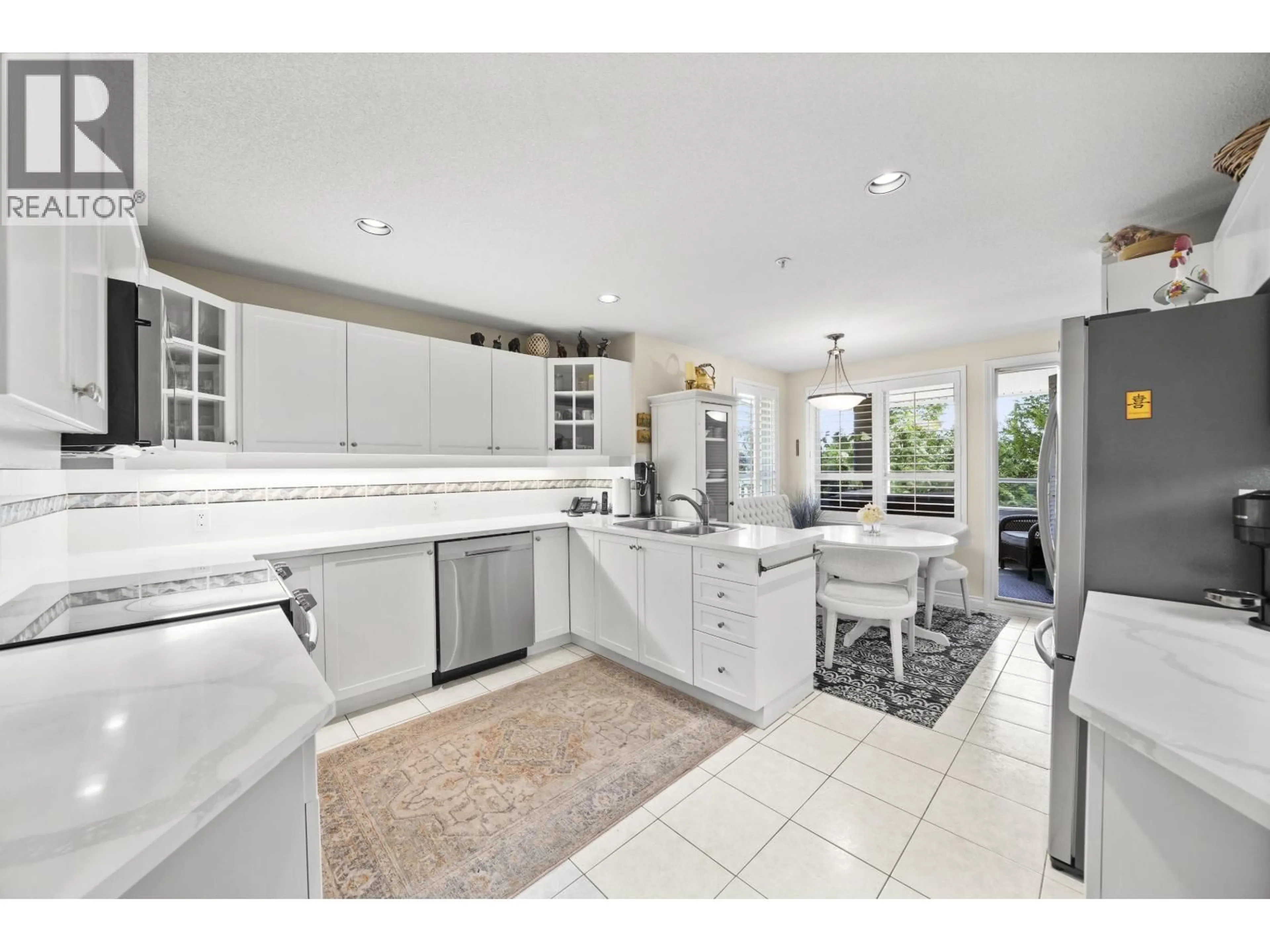 Open concept kitchen, ceramic/tile floor for 204 - 1250 55 STREET, Delta British Columbia V4M3K3