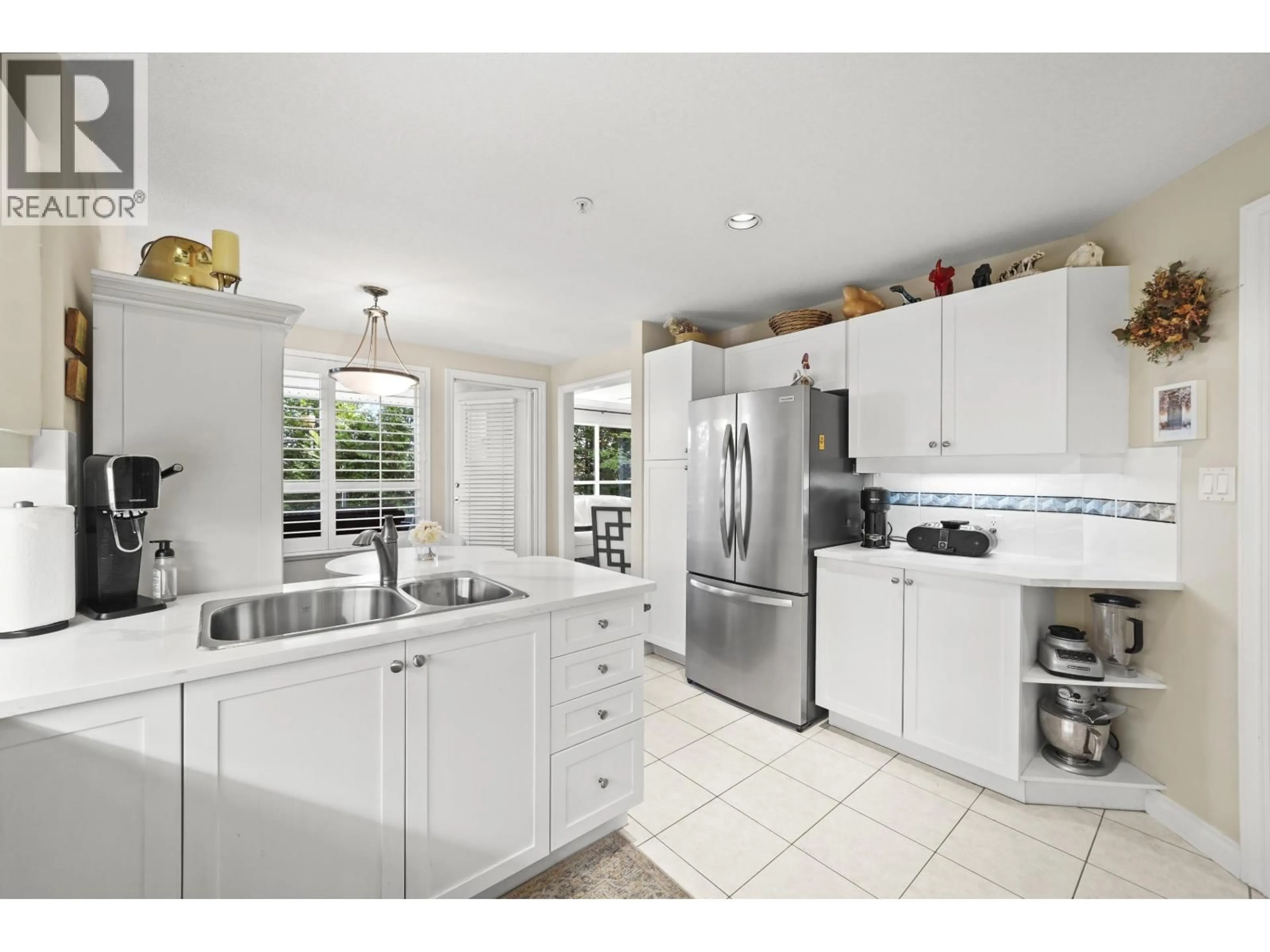 Open concept kitchen, ceramic/tile floor for 204 - 1250 55 STREET, Delta British Columbia V4M3K3