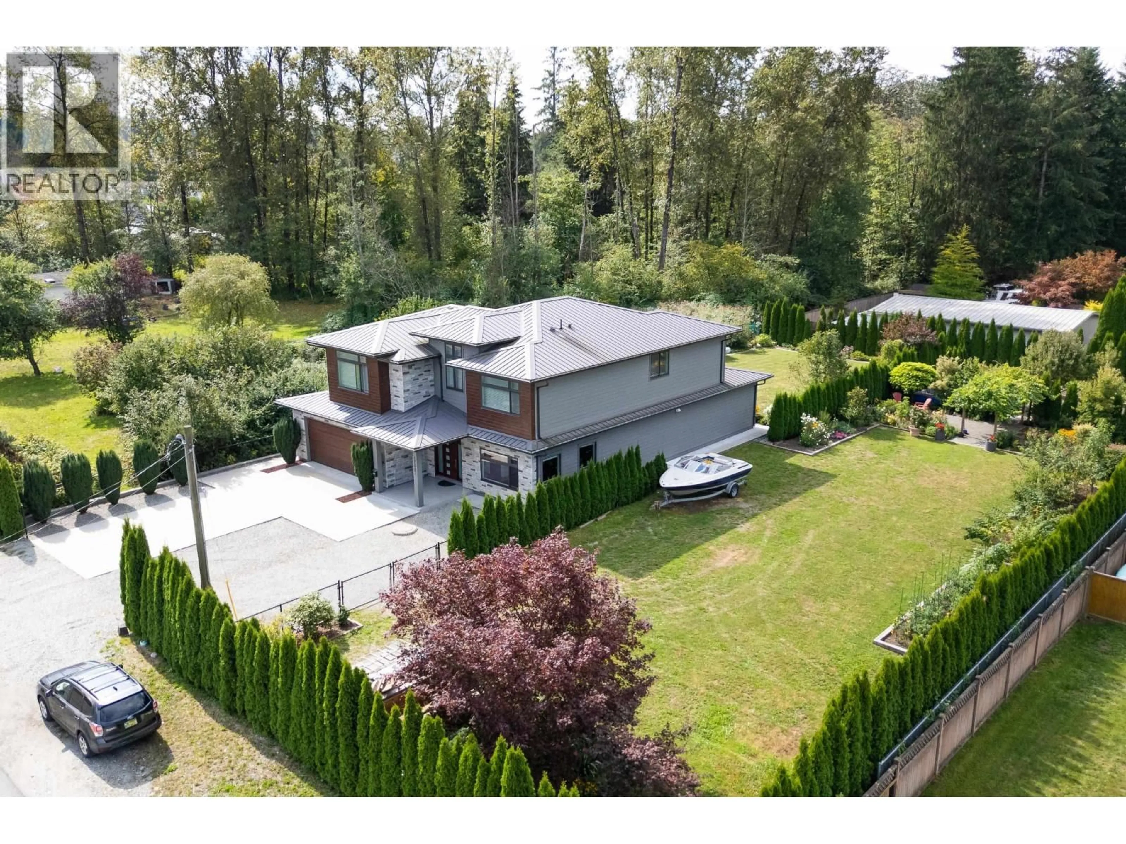 A pic from outside/outdoor area/front of a property/back of a property/a pic from drone, street for 12667 227 STREET, Maple Ridge British Columbia V2X6K4