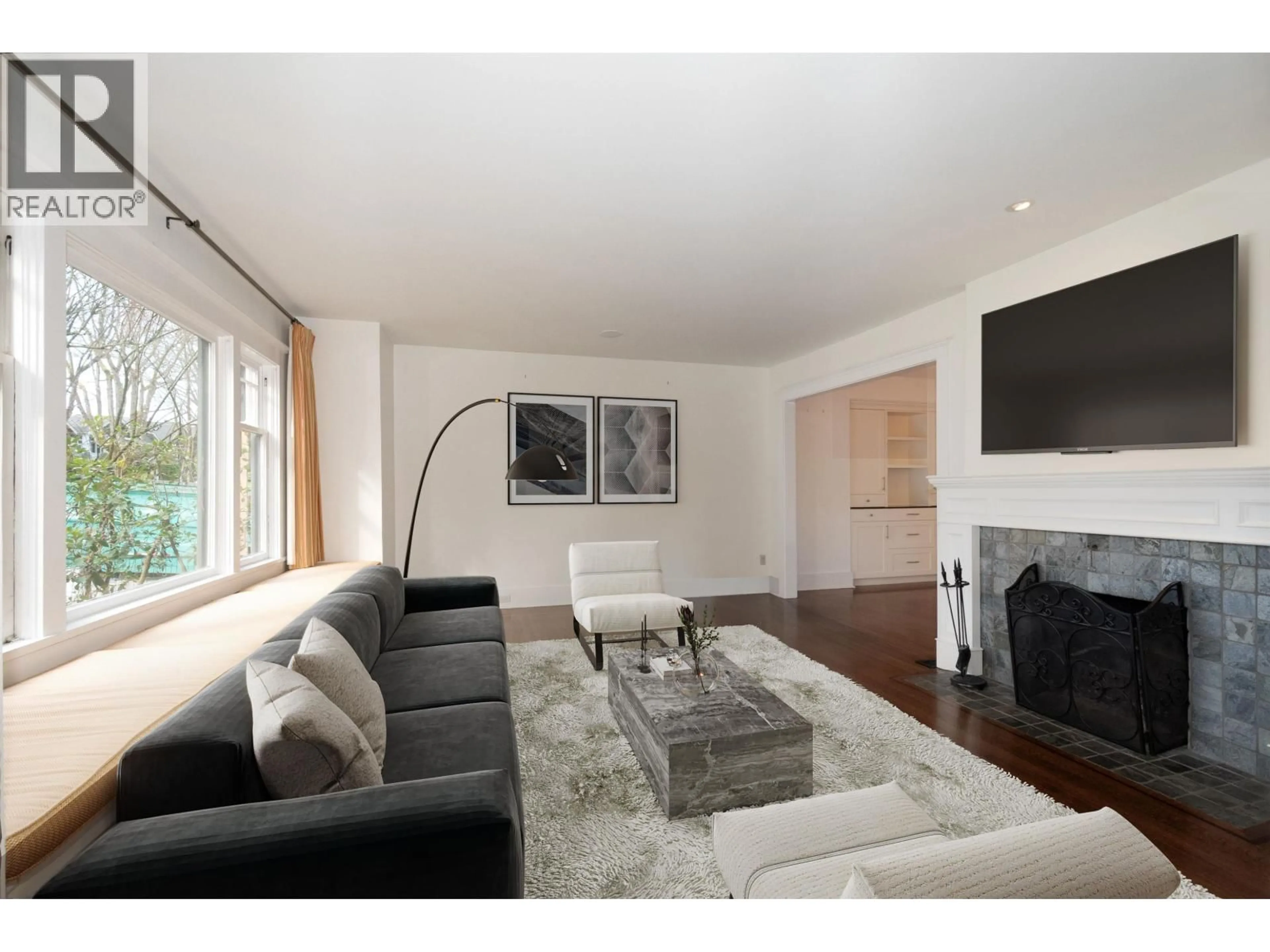 Living room with furniture, wood/laminate floor for 3533 20TH AVENUE, Vancouver British Columbia V6S1E6