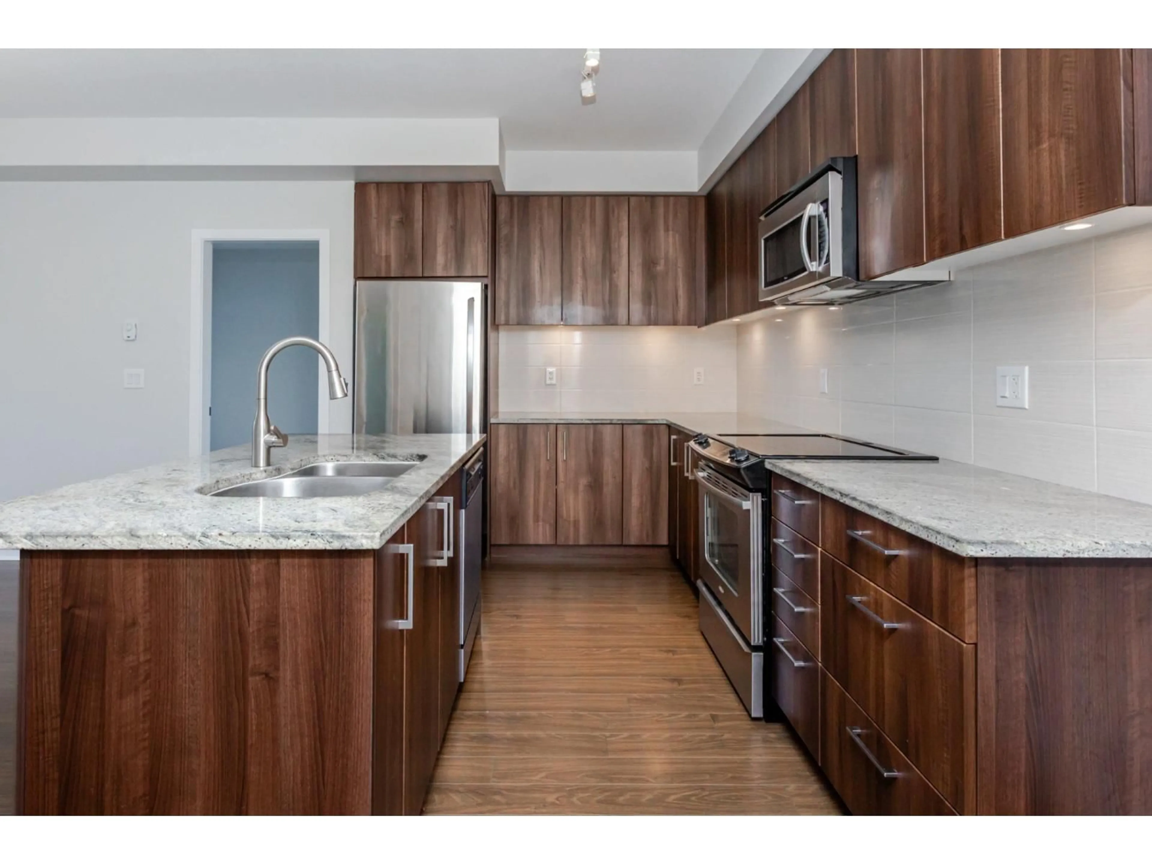 Standard kitchen, wood/laminate floor for 215 - 6460 194, Langley British Columbia V3S1T1