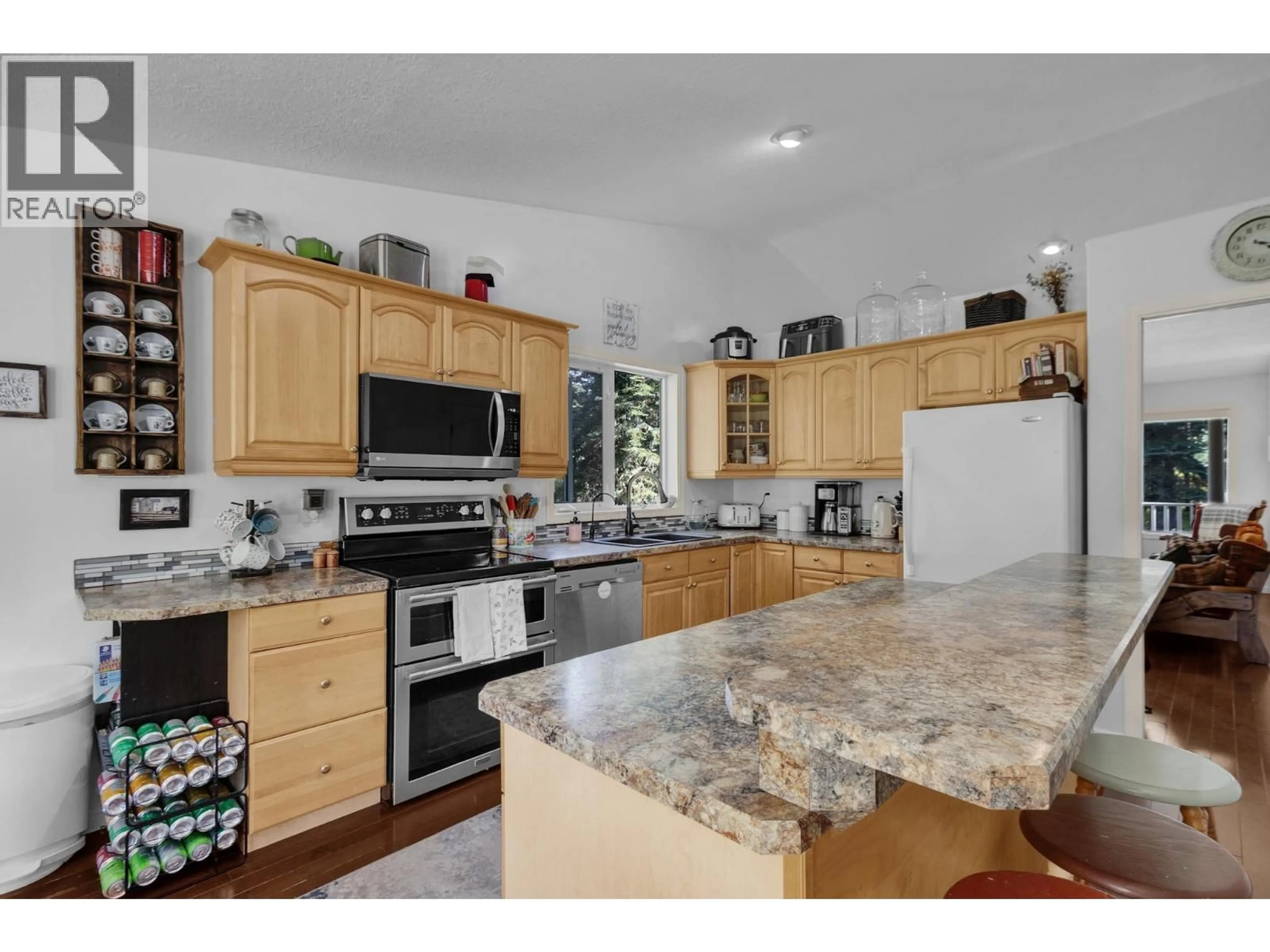 Open concept kitchen, ceramic/tile floor for 7640 BLOCK DRIVE, Prince George British Columbia V2K5J1