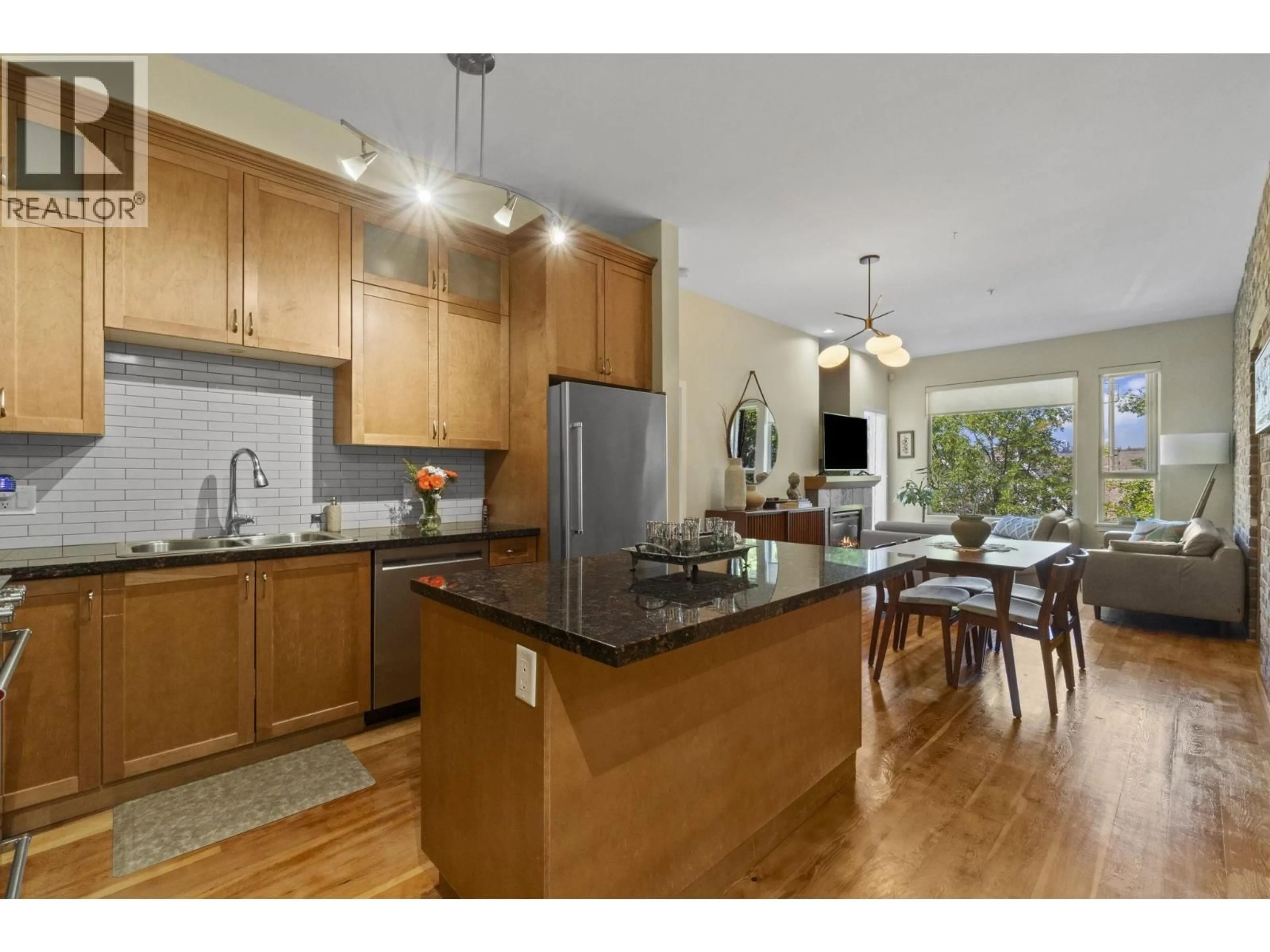 Open concept kitchen, wood/laminate floor for 302 - 250 SALTER STREET, New Westminster British Columbia V3M0B7