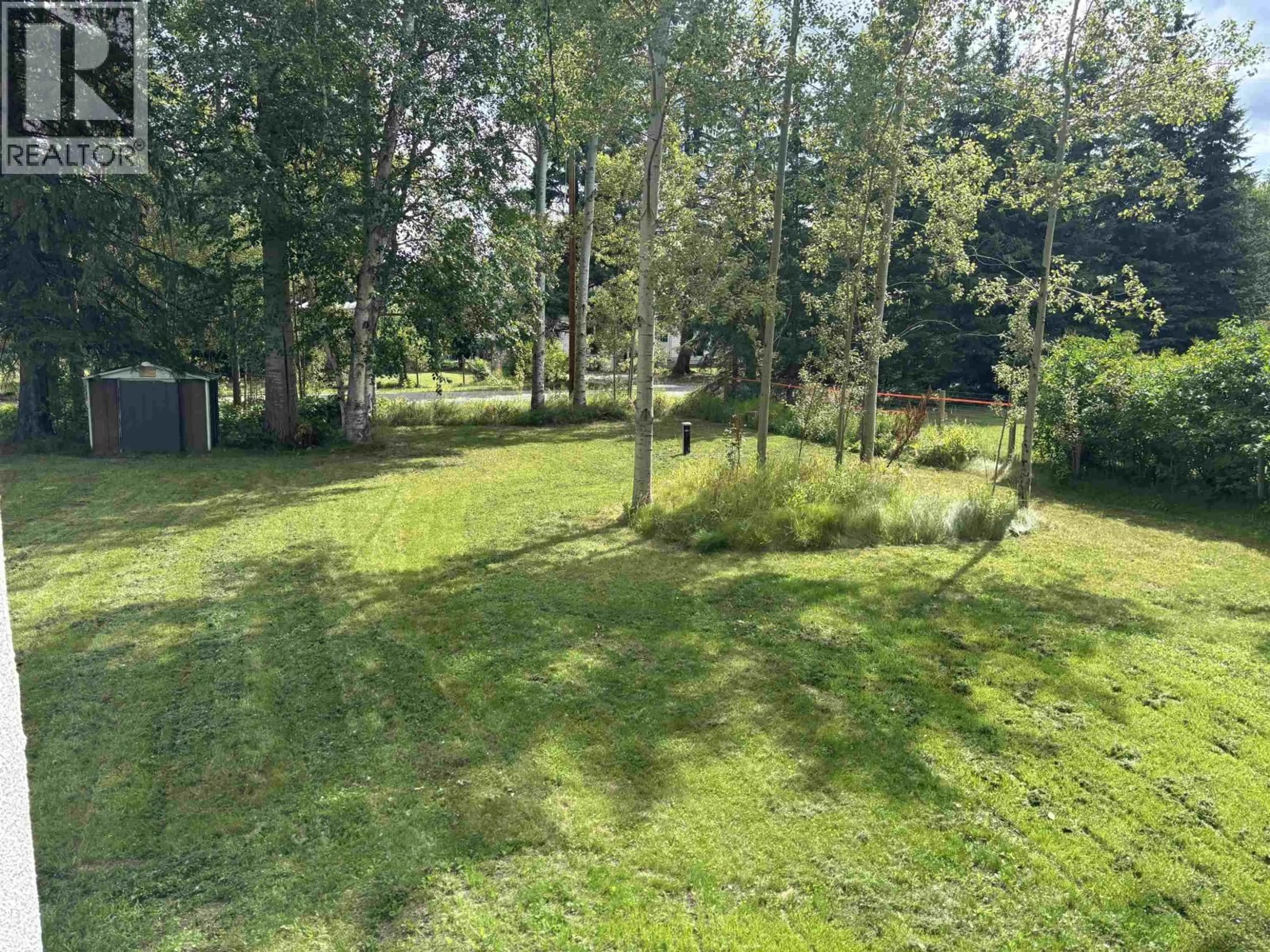A pic from outside/outdoor area/front of a property/back of a property/a pic from drone, forest/trees view for 1617 ARBUTUS ROAD, Quesnel British Columbia V2J4N1