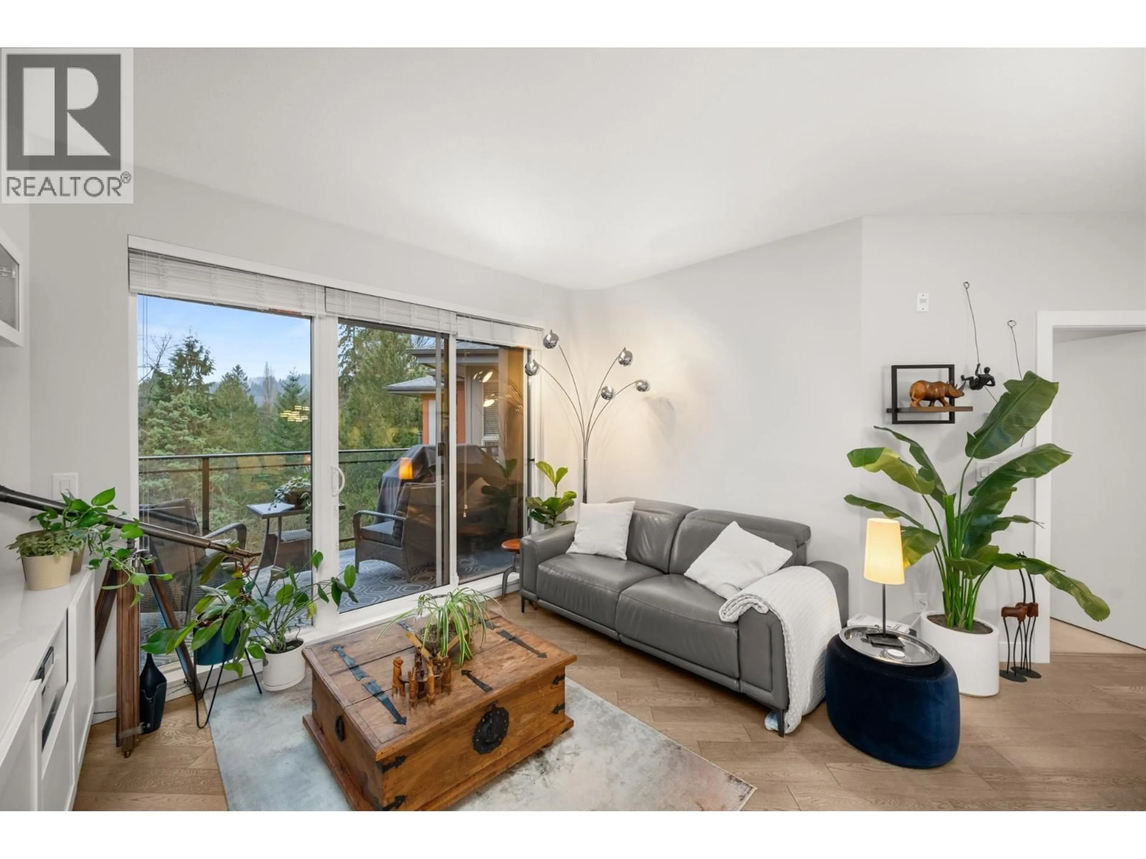 Living room with furniture, wood/laminate floor for 501 - 3399 NOEL DRIVE, Burnaby British Columbia V3J0G8