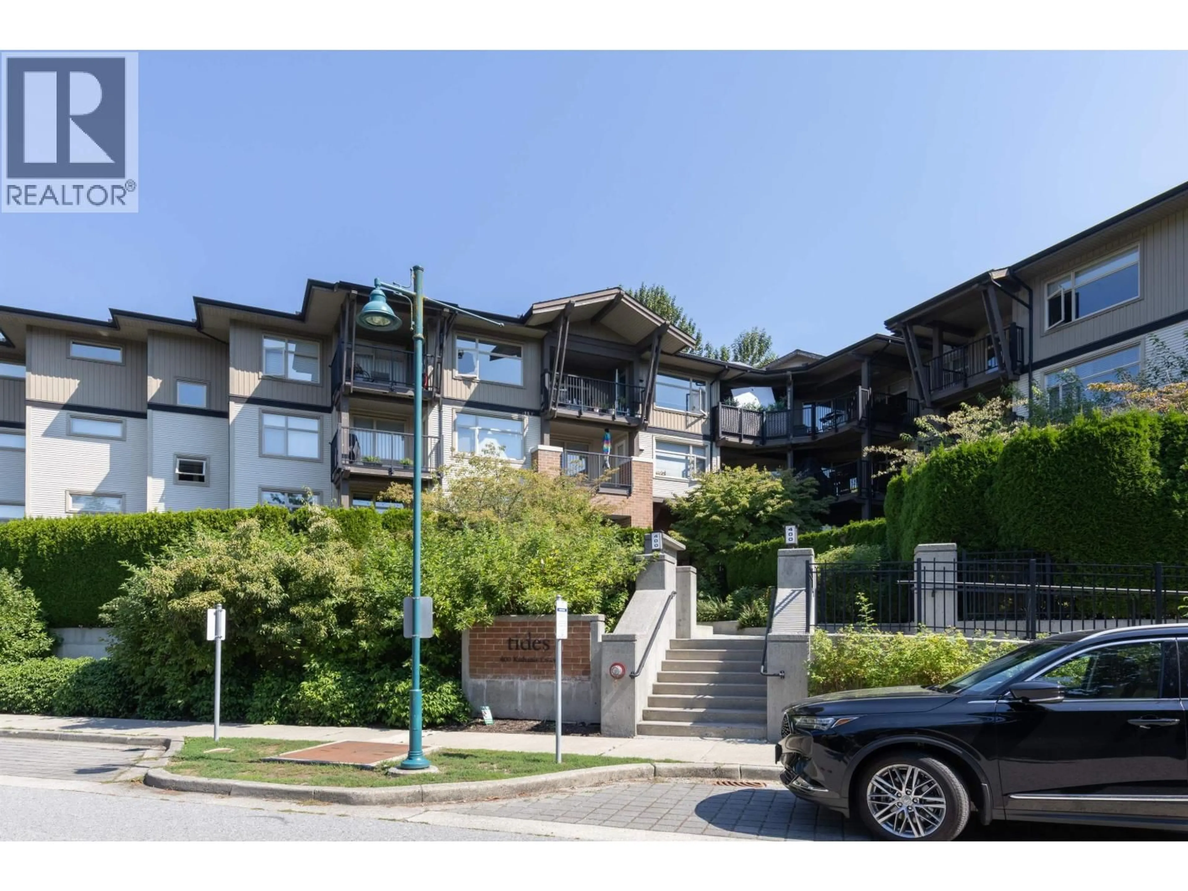 A pic from outside/outdoor area/front of a property/back of a property/a pic from drone, mountain view for 110 - 400 KLAHANIE DRIVE, Port Moody British Columbia V3H5K9