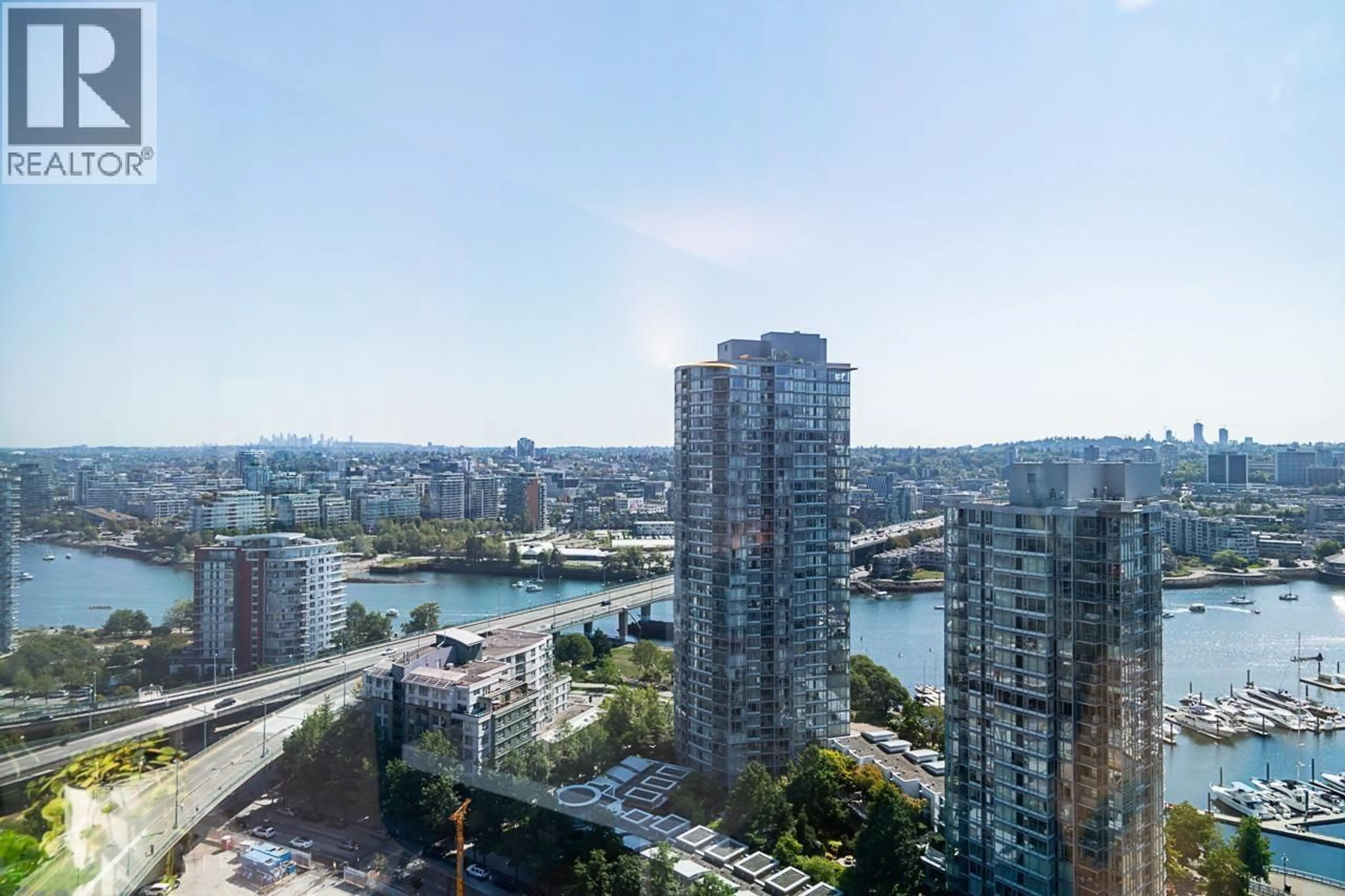 A pic from outside/outdoor area/front of a property/back of a property/a pic from drone, city buildings view from balcony for 3105 - 1009 EXPO BOULEVARD, Vancouver British Columbia V6Z2V9